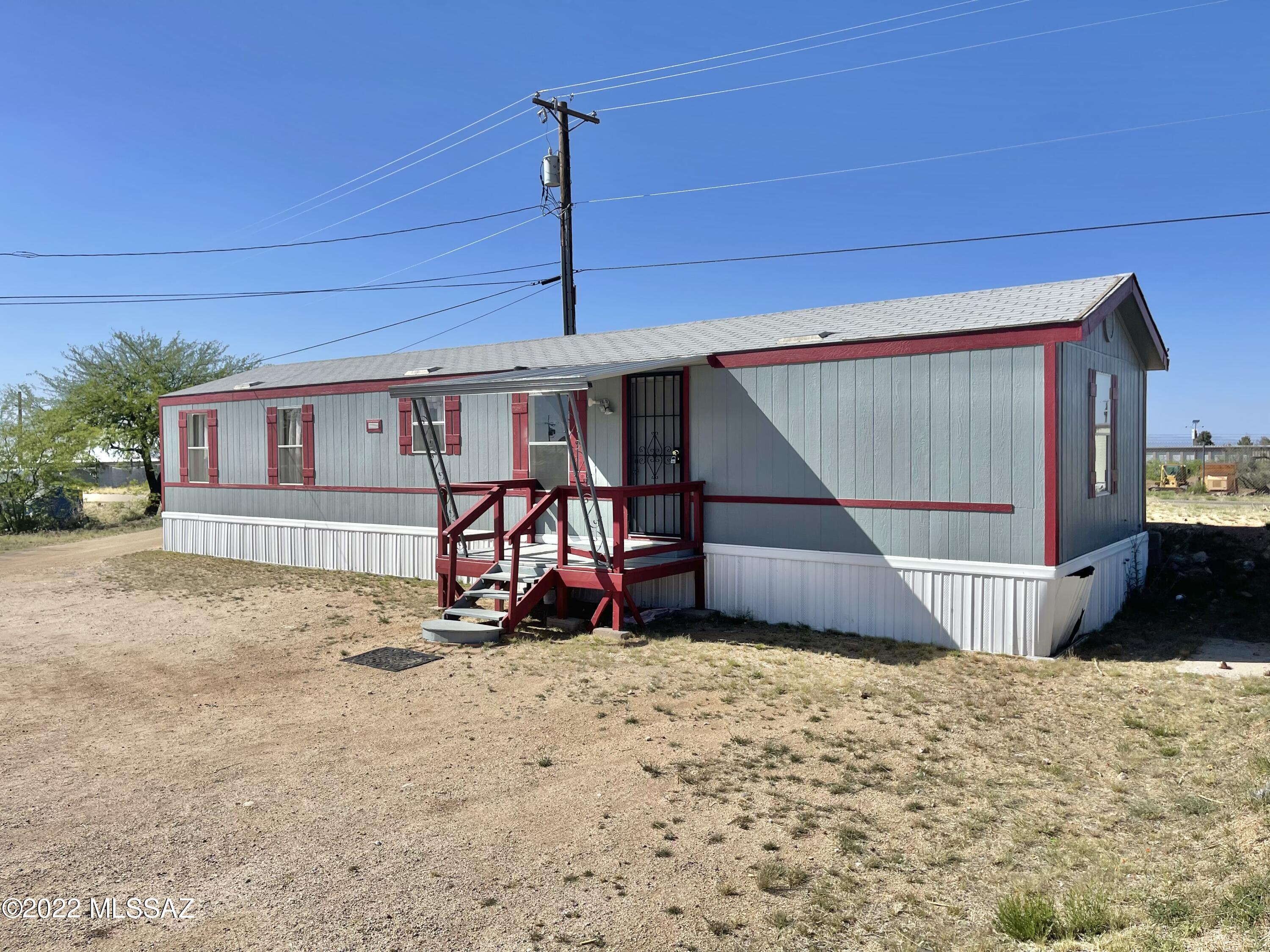 Charming 3-bed 2-bath manufactured home, ready for move-in! All appliances included and will be maintained by owner. Owner is considering installing a fence around the yard. Home is locate behind the commercial units and must be accessed off of Alex Austin Dr. Please text 520-490-5232 with property address and your email for application, deposit info, and to schedule a showing.