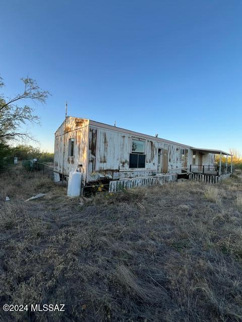 Wrangler Ranches non-habitable manufactured home on .87 acres.