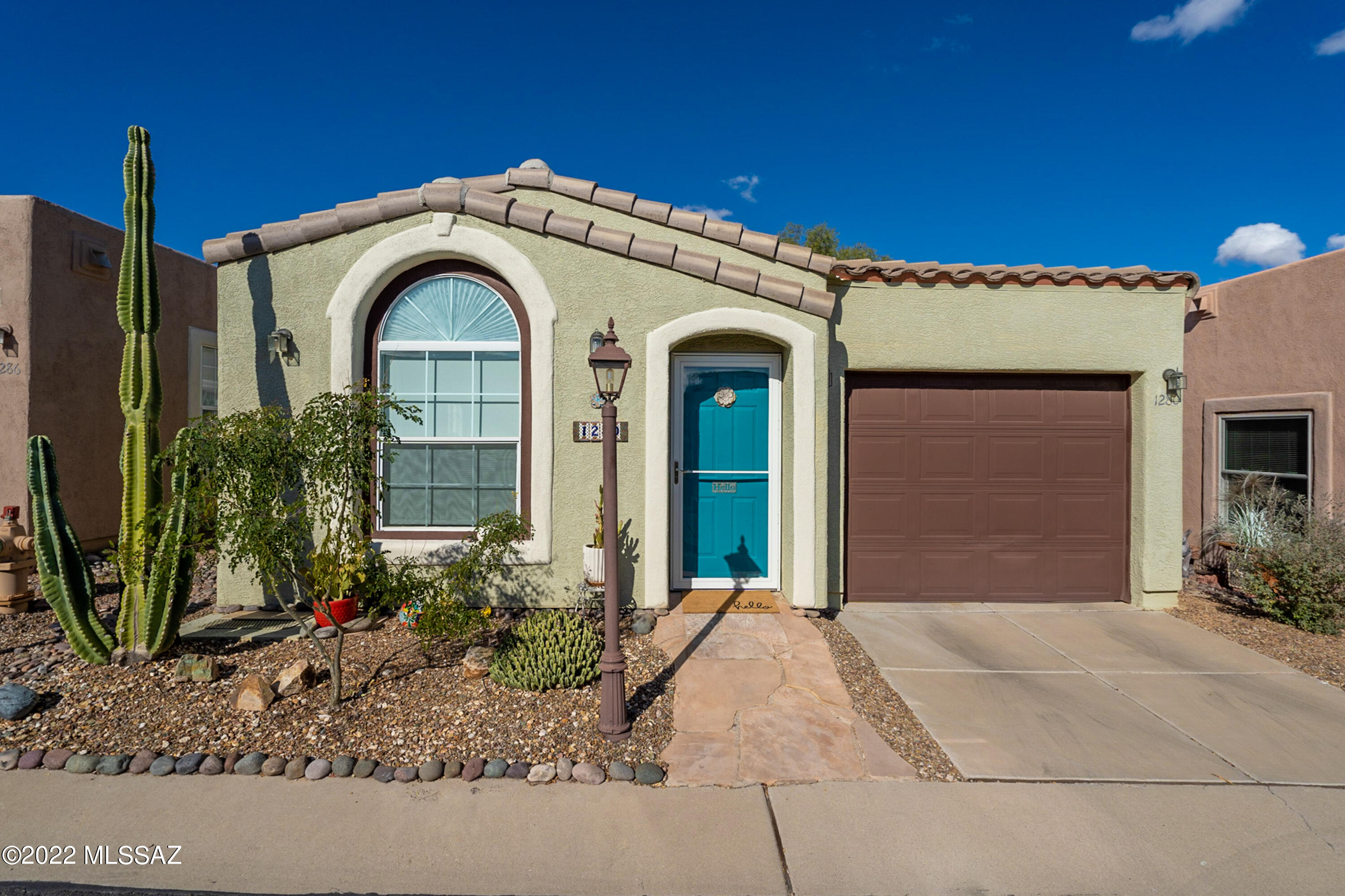 From the moment you pull up to the front door you know this one is special.  This home has been updated and is being sold furnished.   It is just waiting for you to bring your personal touches to make it your own.  It has lots of natural light, vaulted ceilings and a gas range.  The appliances are all newer stainless steel.  With the bonus room, it gives you the space to spread out a bit or have some company.  The large patio is great for entertaining friends or family.  There is also a small garden if you want to plant something special.  The interior has been updated so all you have to do is move in and relax. The attached garage has shelving which gives some extra storage space.  With the clubhouse close by you have all the amenities of the area right there.  Easy care, Easy move!