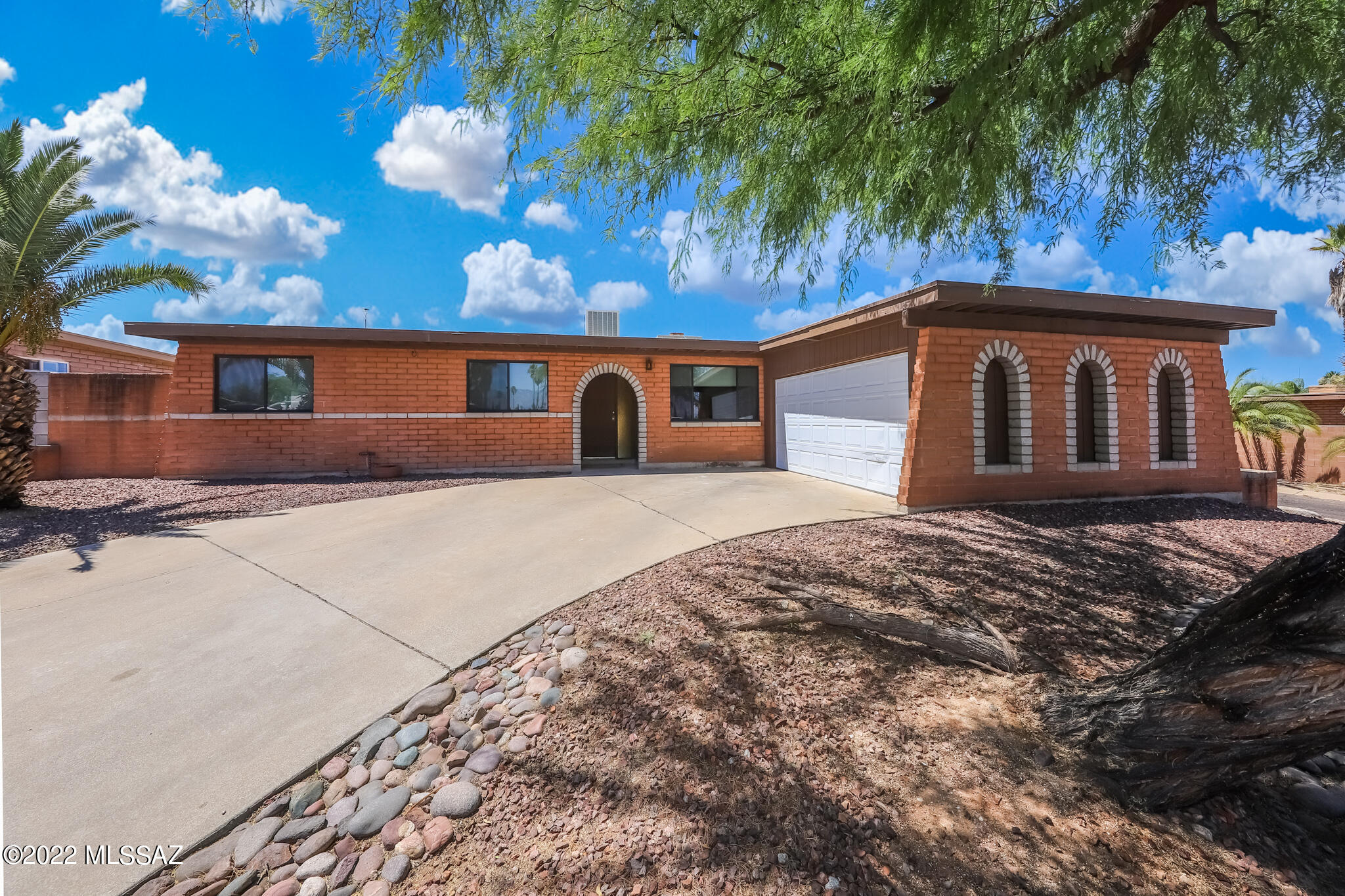What a great opportunity to own this updated home in a fantastic east side location. This 3 bedroom 2 bathroom home with garage is on a .2 acre corner lot and only has one immediate neighbor.  Enjoy the large backyard which was recently landscaped, block wall with new 10' iron gate for trailer access, large covered patio, storage room and new 10' x 12' Tuff shed.  The interior of the home has been updated throughout including kitchen, bathrooms, flooring and more.  This is a wonderful floor plan with a large kitchen, separate family and living areas and a see through wood burning fireplace.  This one is a must see!