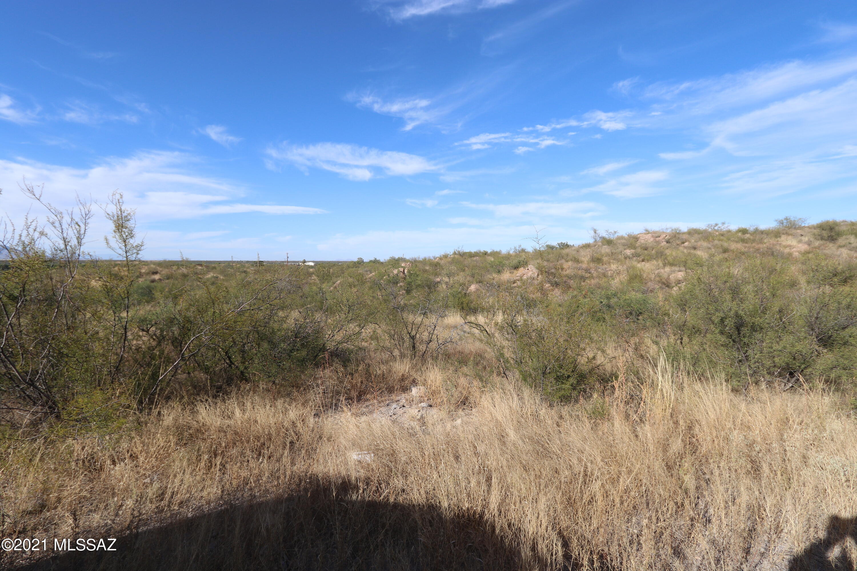 Seller will finance this lot! Build your dream house, or put a manufactured home on this nice 4 acre lot. Near Ft Huachuca and Sierra Vista. ! hour to Tucson, AZ. Secluded private lot. Well Share.