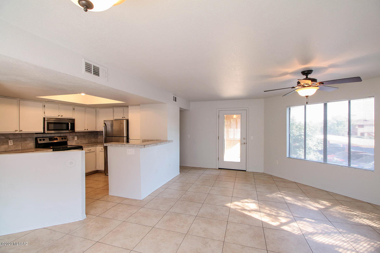 Gorgeous 2bed/2bath Condo in the prestigious Gated Community of Villas at Sabino Canyon with Catalina Mountain views and community pool, spa, fitness room, and reserved covered parking spot.