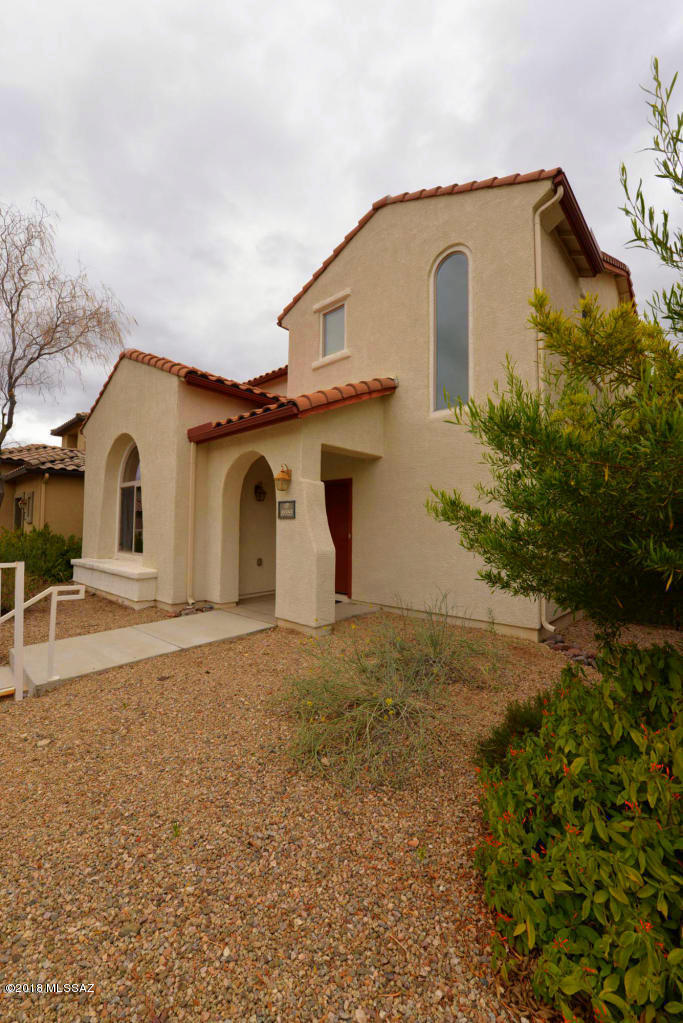Sierra Morado Neighborhood, move-in ready 3Bd/2.5Ba home, Award Winning Vail School District situated near the Foothills of the Rincon Mountains. Solar water heater, dual flush toilets and dual pane windows. The kitchen includes classic black appliances-stove and microwave, staggered height cabinetry, granite counter tops and bar. Under stair storage room. Low maintenance outdoor patio yard. All within easy walking distance are walking/jogging/biking trails, large community pool, basketball courts, picnic ramadas, playground and a clubhouse for entertaining.