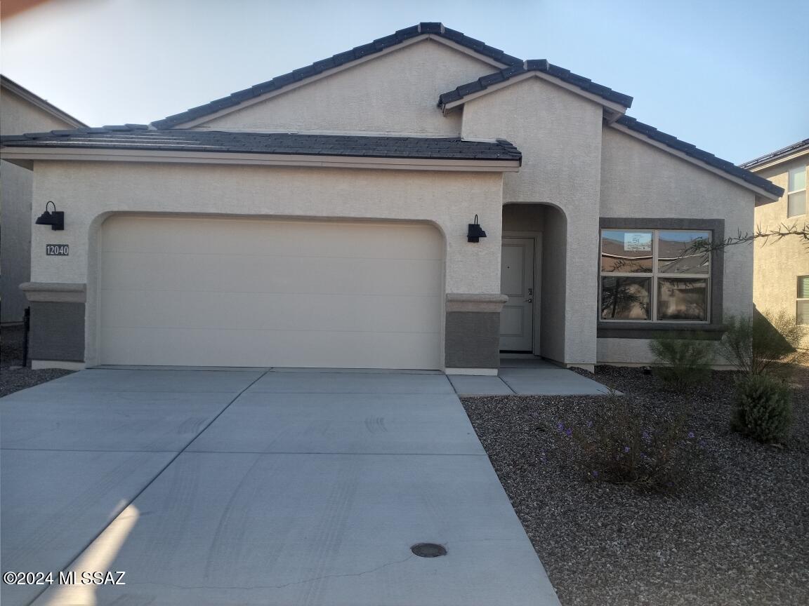 We brought this popular 5BR 3 BA 1 story floorplan back.  Completion  2024.   The kitchen has white cabinets, granite countertops, gas stainless range, built in microwave nice pantry and LED lighting. You will find18x18 tile everywhere but bedrooms, dual vanities in the primary bath, 9' ceilings, covered patio, tankless gas water heater and lots more. This property is situated in the desirable Hanson Ridge community, providing convenient access to I10 for easy travel throughout Tucson. It's also close to shopping amenities and located within the sought-after Vail School District. t