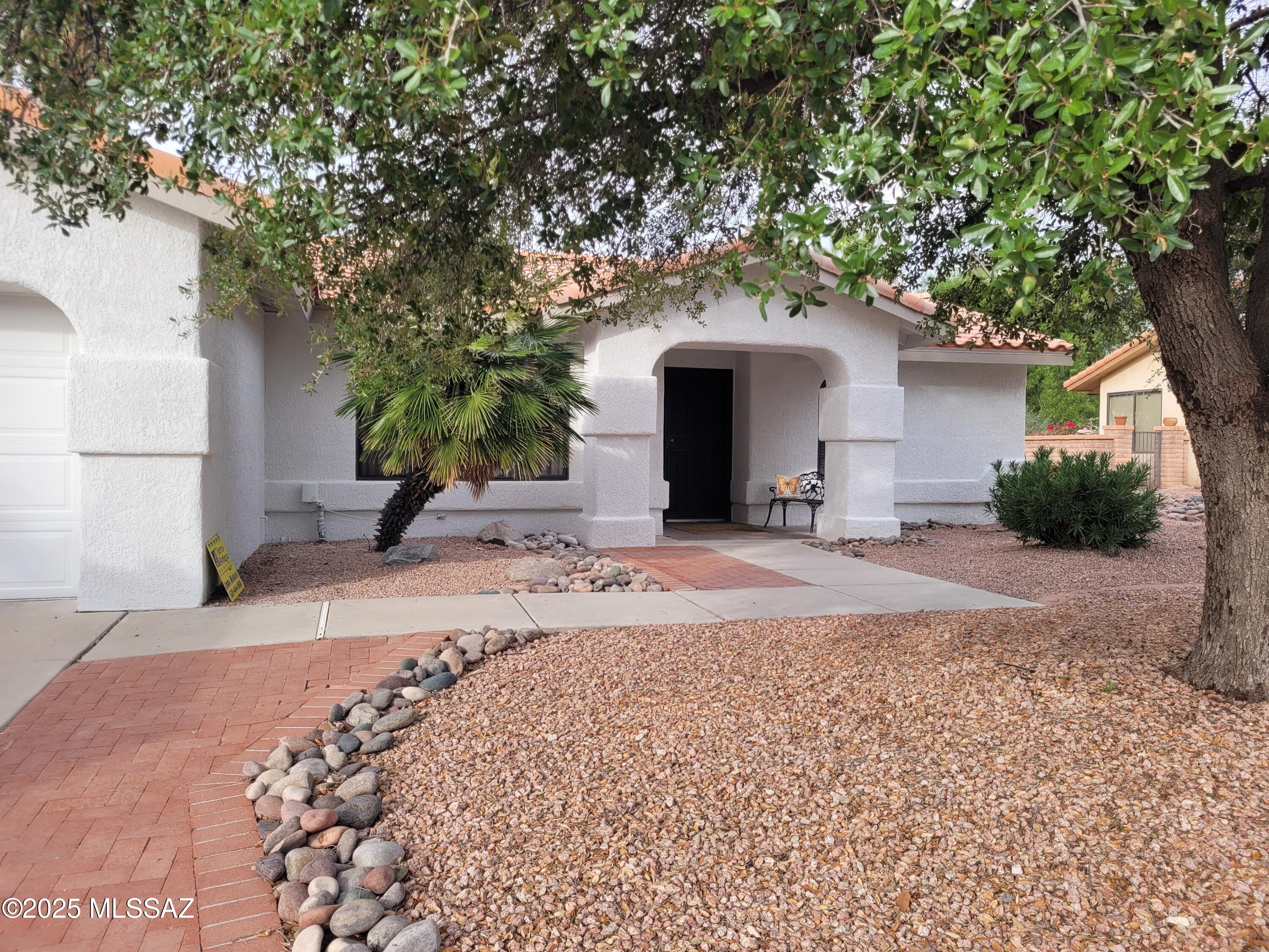 This beautiful home located in Sun City, which is a very desirable active adult community.  Come and enjoy the wonderful and many amenities that this community has to offer.  Golf, swimming pools, pickleball, tennis, bocce ball courts, aquatic & fitness center, racquet ball court, miniature golf, numerous clubs, restaurant, endless amenities and activities, the lists goes on and on.  This home sits on a large lot.  Newly painted, new blinds, granite countertops, tile flooring in main living areas with carpet in bedrooms only.  Split 2 bedroom floor plan.  New guest bathroom vanity.  Newer washer & dryer stay.  Buyer to pay one time HOA CAP Fee $3,945.00.  HOA transfer fee $370
