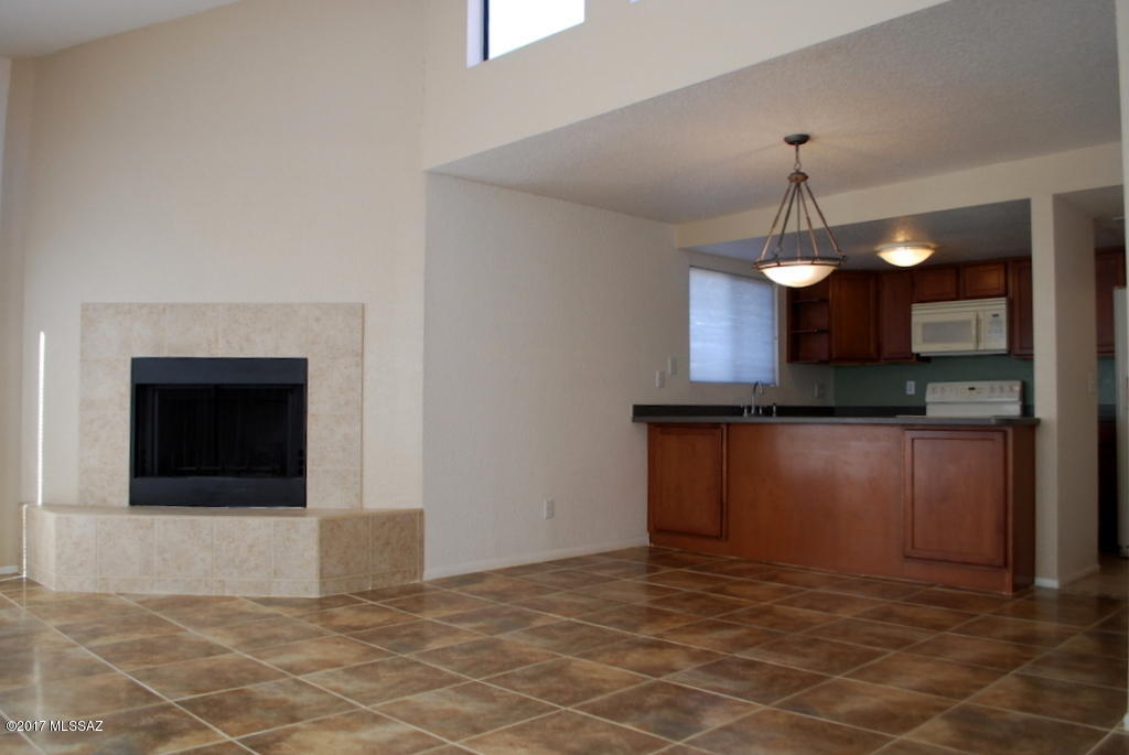 Well cared for 1 Bed 1 Bath Foothills Condo in the Gated Ventana Vista Community. Updated kitchen with maple cabinets and newer appliances. The unit now has all tile floors which is not reflected in the photos. Living room feels very open and has lots of natural light. Bedroom is good sized and master bath has been updated and dual sink vanity. Central A/C & Heat and a separate storage unit. Views of Sabino Mountain from patio space. Community has pool, hot tub, rec center, tennis courts and exercise facility. Water,sewer,trash, HOA fees included in rent price. This unit is offered as NON-SMOKING. Small pets negotiable.