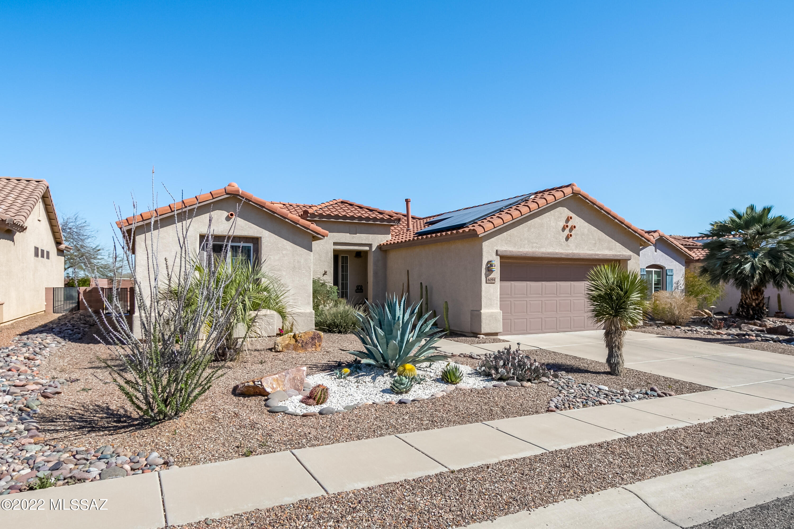Rare opportunity to own the popular San Carlos model in resort style Sunflower active adult community. No high electric bills here seller purchased solar system. NO LEASE to worry about.  Tucked on a premium lot w/Catalina and Tortolita Mountain views backing to wash for added privacy.  Enjoy the best of AZ outdoor living w/extended covered patio, brick pavers & endless mountain views!  Homes boasts new wood Vinyl flooring in main areas, neutral colors & new HVAC installed in 2020.  Flexible plan options-Two bedroom/den/office or 3rd bedroom plan you decide.  Spacious kitchen w/plenty of workspace & cabinet storage.
Master suite w/executive height dual sinks, walk in shower and large walk-in closet.  Don't miss a chance to own in this highly sought-after community w/amenities galore!