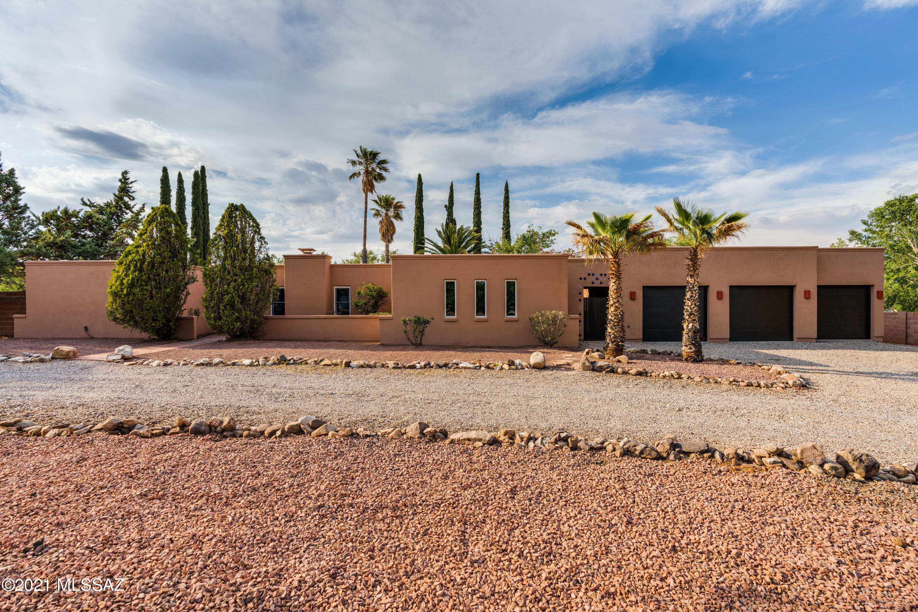 This one of a kind Southwestern home sits on just over 1.3 acres and has 4 bedrooms/3 bathrooms in the main house. Featuring a brand new kitchen: new cabinets, stainless steel appliances, and granite countertops! Plus 2 wood burning fireplaces to enjoy on those cooler winter nights, an oversized 3 car garage, and close proximity to Ramsey Canyon Preserve. It doesn't stop there...Step inside your Guest Casita which has 2 bedrooms and a full bathroom, in-unit laundry, and a full kitchen. Perfect for guests or use it as a vacation rental for additional income! Your backyard is an oasis and entertaining dream. Enjoy the expansive patio and endless opportunities to make it your own while taking in the views! Call today for your personal tour!