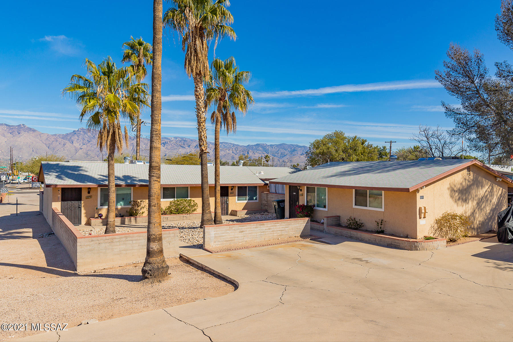 Range Price from $325,000-$350,000. Updated triplex with two 2BR/1BA units and one 2BR/2BA unit. Great central location! Perfect for owner occupant and investor. Large private walled rear yards with covered patios. Extensive renovations include remodeled kitchens and remodeled bathrooms in each unit. Updated ceramic tile floors. Updated heat pumps (2017 and 2018). Concrete off street parking areas. Tenants pay electric. Owner pays water/sewer. EZ to rent. Close to dining, shopping, bike route and bus lines. Only 4 miles east of the U of A.  Address is 5501, 5503 and 5505 E 2nd Street.