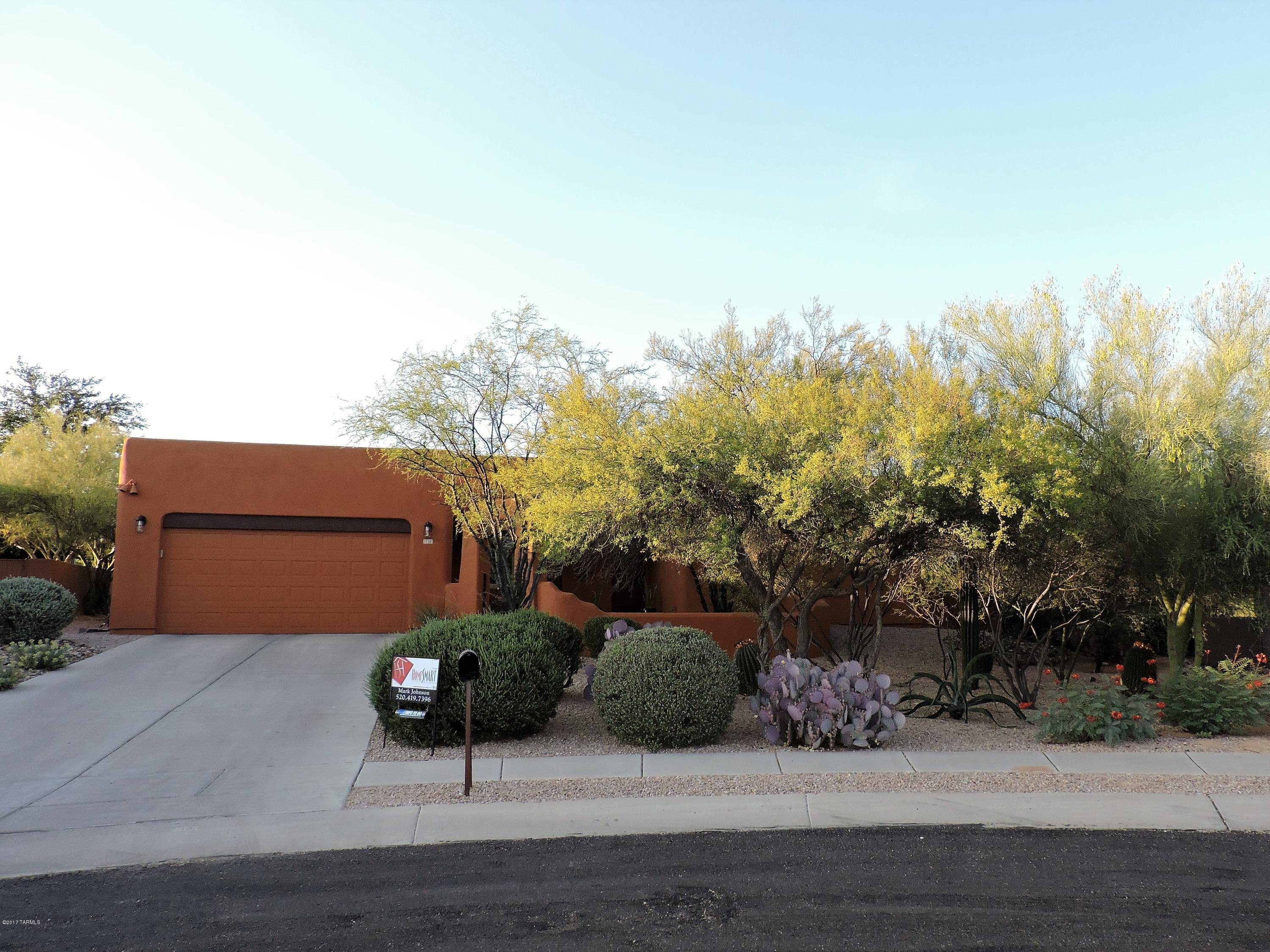 Quite cul-de-sac, immaculate 3060 sq ft, Bednar built, Fully remodeled 5BDRN/3BA home on very private nearly 1/2 acre lot with mountain views, surrounded by natural desert. Inviting gated courtyard entry. Dramatic wood beamed ceilings in main living areas and front and rear patios. Open floor plan with 2 large living room areas. Open kitchen with hickory cabinets, stainless appliances and high end granite in kitchen and all baths. Breakfast/dinning area with beehive fireplace. Large guest bedrooms with walkin closets and plenty of interior storage space, possible multi-generatinal suites. East facing extended rear patio, natural Pebble Tec pool with rock waterfall. Recent paint inside and out. Close to top rated schools.
