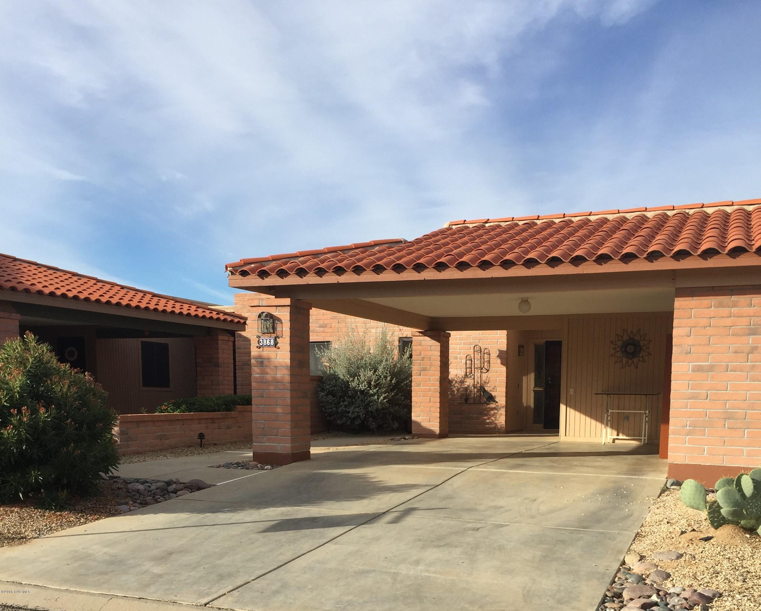 Warm and cozy townhome in great location. Inviting rear patio with mature plants bathed in afternoon sunlight. Large storage off carport. Laundry room is off the rear patio. HVAC replaced three years ago. Water heater new in 2015. Water softener is rented.
