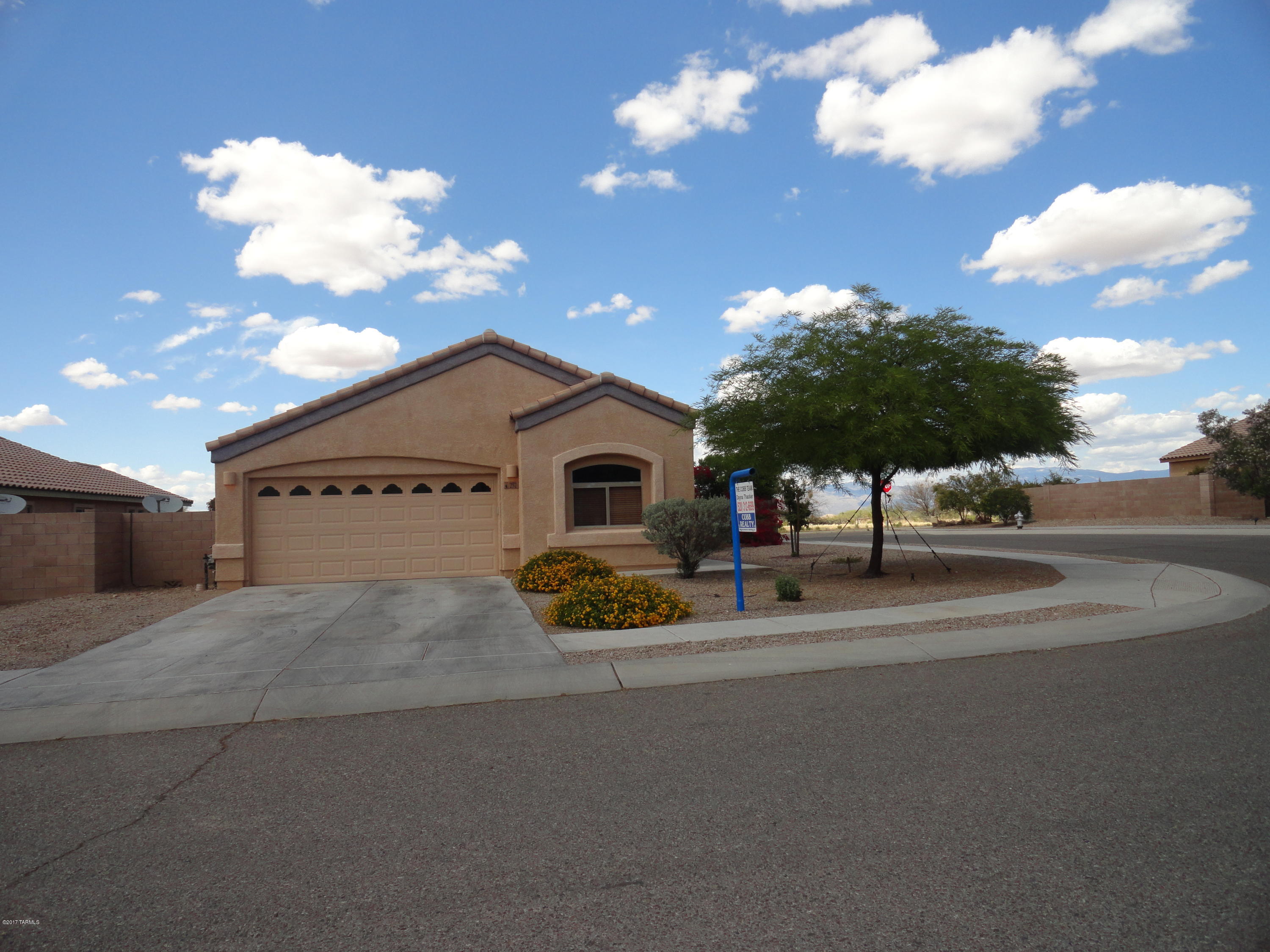 Gorgeous 3 bedroom, 2 bath home on a corner lot with mountain views.  Kitchen features all stainless steel appliances and granite counter tops.  Tall ceilings and ceiling fans in every room.  Wood blinds stay.  Gorgeous backyard has an extended porch, custom fireplace, pergola with honeysuckle, and grass with irrigation.  Come and see this turn-key ready home today.