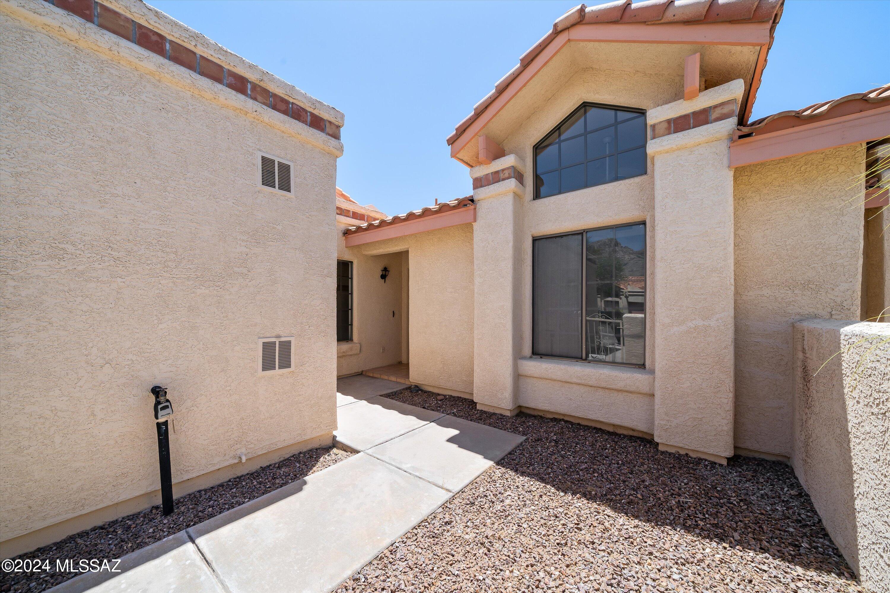 Ready to Move In! Located in the desirable Horizon Heights community, this open-concept features brand-new flooring throughout, fresh paint, and all-new plumbing (No PolyPiping). Features include high ceilings, a breakfast bar, a dining nook in the kitchen, ample storage space, a 2-car garage, dual sinks in the primary bathroom, and a private covered patio that backs up to the natural desert. Enjoy community pool and spa amenities, and proximity to El Conquistador, the Oro Valley Aquatic Center, fitness facilities, shopping, golfing, hiking, dining, biking, and more. Perfect for easy lock-and-leave or year-round living. Come see what the Oro Valley lifestyle has to offer!