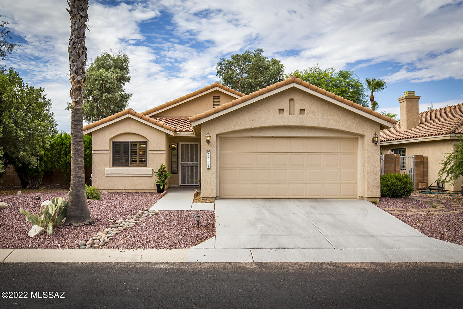 Move in ready elegantly updated and appointed home in prime Sabino Canyon location. Gaze at the mountain views from the large side yard and enjoy the majestic fountain with no neighbors directly behind the home. You will love the open plan graced by high end tile, plantation shutters, vaulted ceilings and plenty of natural light. The remodeled kitchen and baths will not disappoint! High quality stainless steel appliances and granite in the  kitchen. The bathrooms have beautifully tiled surrounds and wall tiles. So close to the Loews Ventana Resort and Country Club and District, 16 schools and Sabino Canyon.
