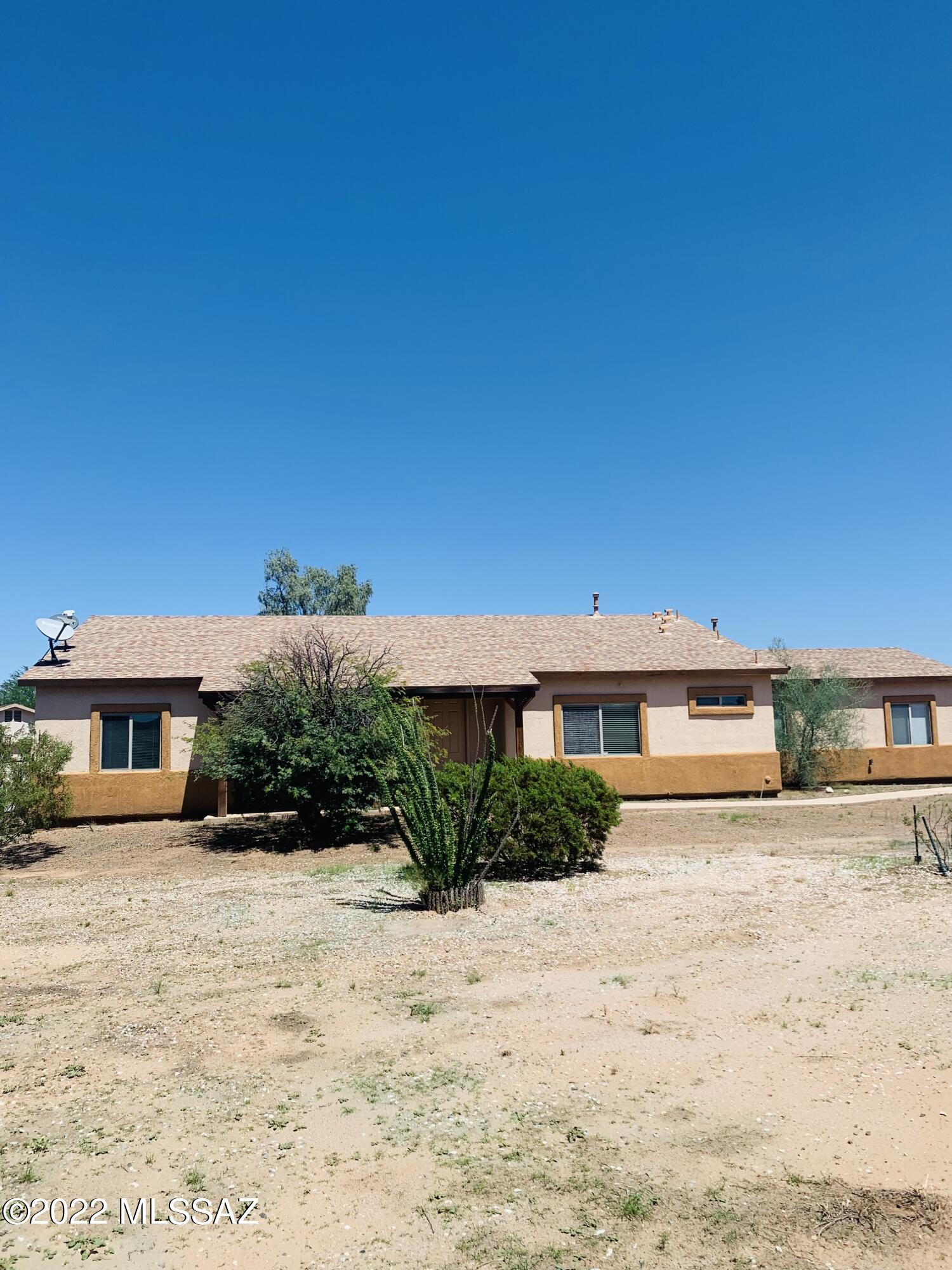 Welcome home! Spacious 3 bedroom/2 bath, sits on almost 1 acre.  This beautiful home has recently been upgraded to include new carpet, fresh interior paint, granite counter tops and stainless steel appliances, that include range, microwave and dishwasher. Also includes covered front entry porch and rear covered patio. Attractive feature is the way this home is situated which allows for a large front yard and large back yard. Plenty of space here!  Come check out this beautiful home!