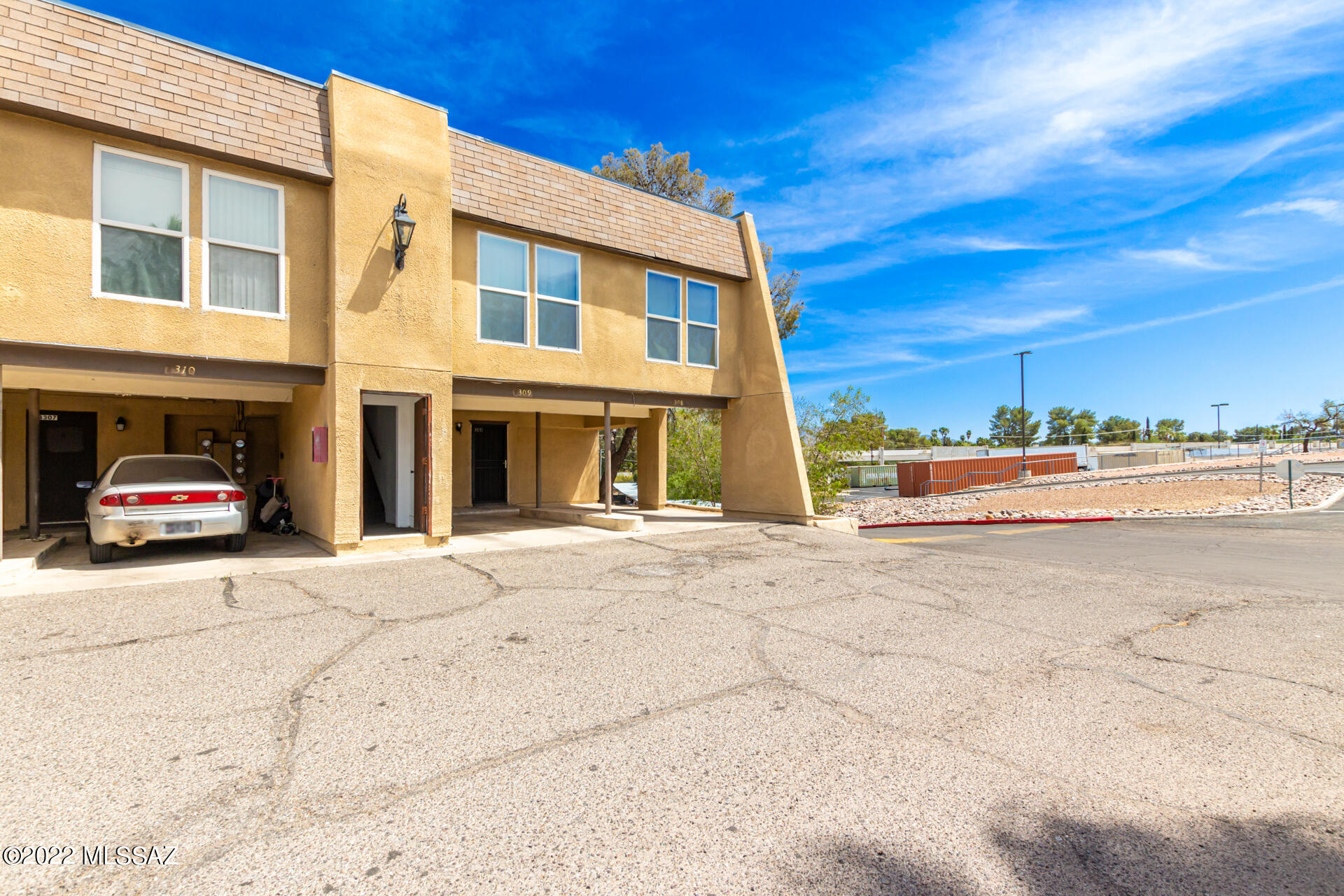 This beautiful 1 bed, 1.5 bath loft style condo is just waiting for you! Located close to restaurants, parks, and shopping spots. Take a look at this welcoming interior offering everything you have been looking for; handsome tile flooring, a fresh palette, abundant natural light, a spacious living/dining area, and a relaxing balcony and backyard with a great view. The lovely kitchen features plenty of cabinet space, tile counters, SS appliances, and a breakfast bar. The cozy bedroom boasts private backyard access, a private bathroom, and walk-in closet. Carport parking directly in front of condo entrance and a quaint backyard where you can spend a relaxing summer evening! Hurry! Come and see it before it's gone!