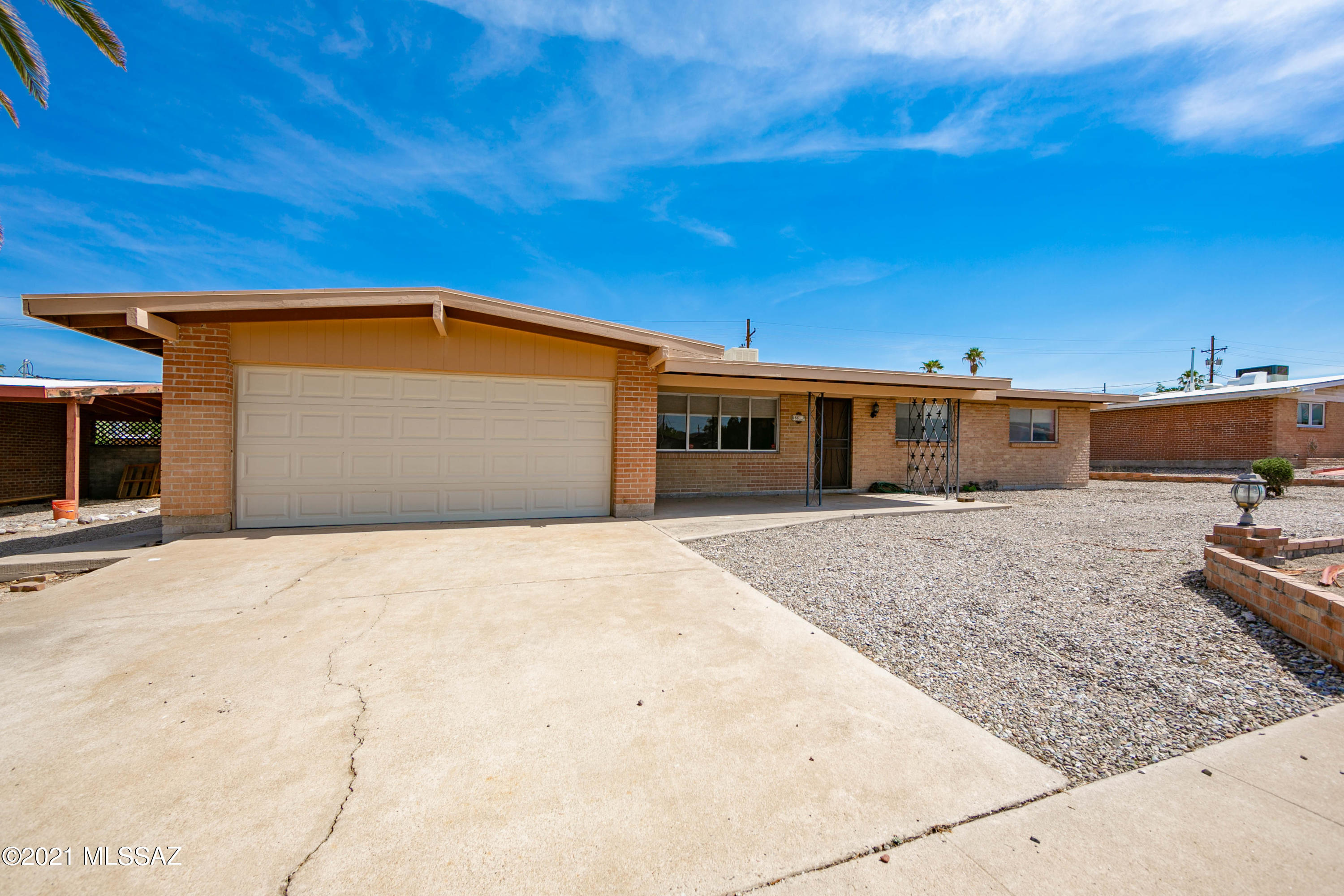 Centrally located 4 bedroom/ 3 bathroom home is waiting for you! Two separate primary bedrooms with on suites. West Wing primary bedroom has mini split AC unit for individual comfort setting.  Hard floor throughout. Good size yard with storage shed in the back. Lots of space inside and out to make this house your home!  Close to everything you need. Catch a look at this one before it's gone!