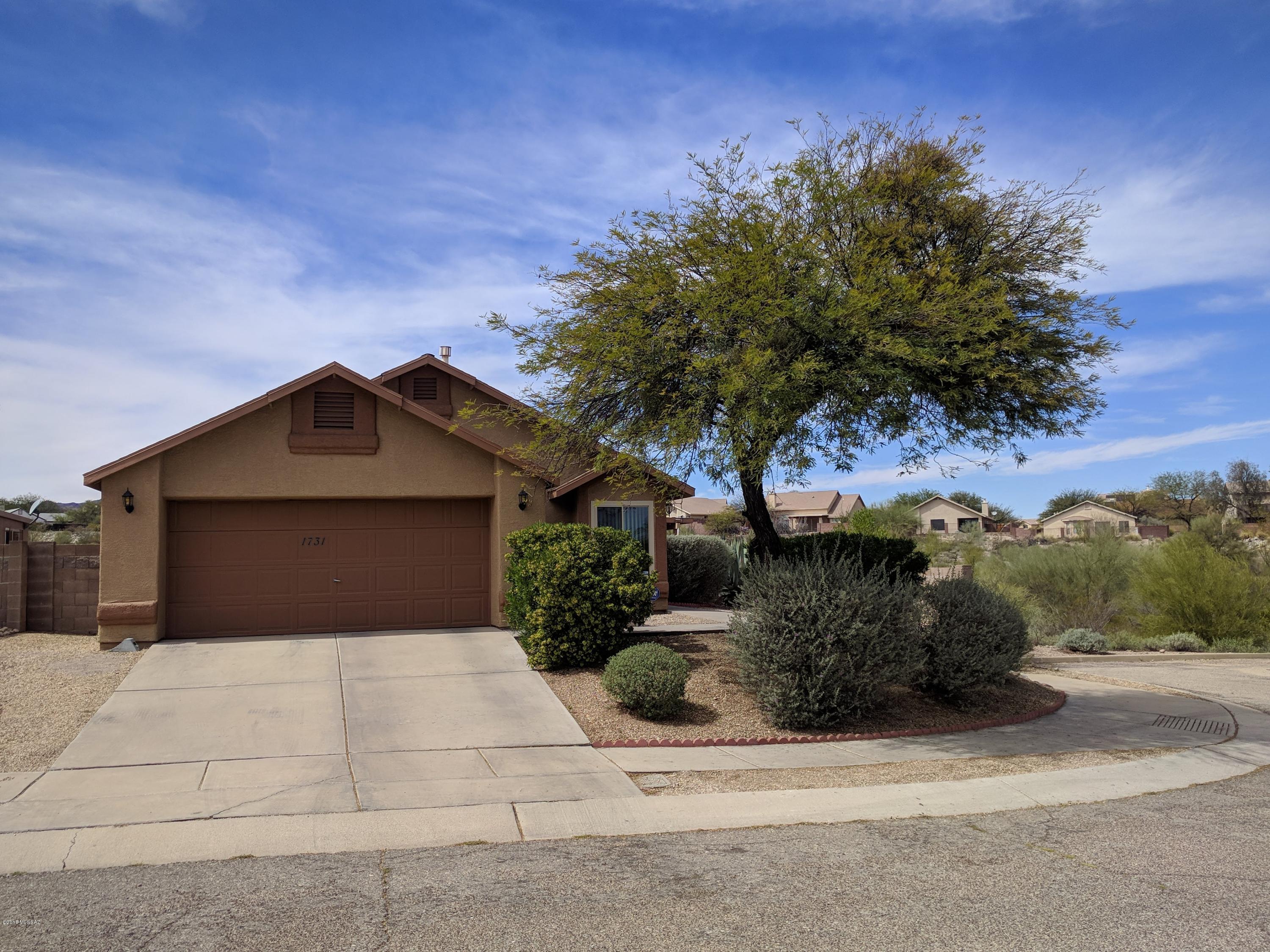 Range Priced-Seller will accept or counter offers between $185,000 & $195,000. Beautiful, Meticulously Maintained Treasure. Super Premium corner cul-de-sac lot bordering on major natural desert open space abounding in desert vegetation (including Saguaros). Panoramic Mountain & City Vistas to DIE FOR.  Great Room Format with 2 lovely bedrooms and a Flex Room, PLUS an awesome Permitted Bonus Room (with it's own brand new A/C-Heat mini-split system, just installed 3/29/2018!). A wonderful upgraded/expanded Kitchen (Refrigerator included!) w/loads of Counter & Cabinet space, PLUS a Pantry & Electric Skylight. Rest a while on the large tranquil covered patio and fall in Love today! Ceiling Fans*French Doors*Dual Pane Windows*Laminate*tile & MORE!!! NO Polybutylene-home was replumbed in 2011.