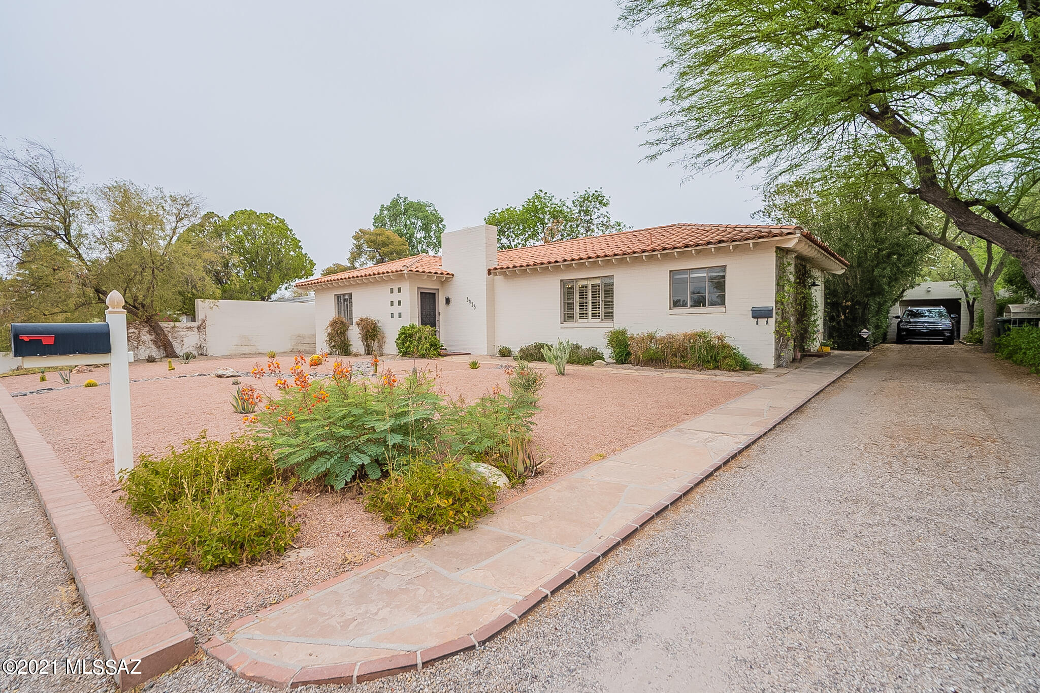 Beautifully updated within the historic San Clemente Neighborhood, this charming 3 bed/2 bath home welcomes you with natural light from an oversized picture window, highlighting original wood floors & fireplace. Fully remodeled kitchen features quartz counters, shaker cabinets, & deep farm sink. Modern slate-colored appliances include a 5-burner gas stove & counter-depth refrigerator. Hall bath wows you with Carrera marble flooring and shower niche, quartz countertops & glass shower surround. Interior features continue with new engineered hardwood in 2 bedrooms, new PEX plumbing throughout, Nest smart thermostat, new electrical lines and panel, & water pump circulator. Mature trees, newly landscaped yards & has historic tax status! Situated just moments away from golf, dining & shopping.