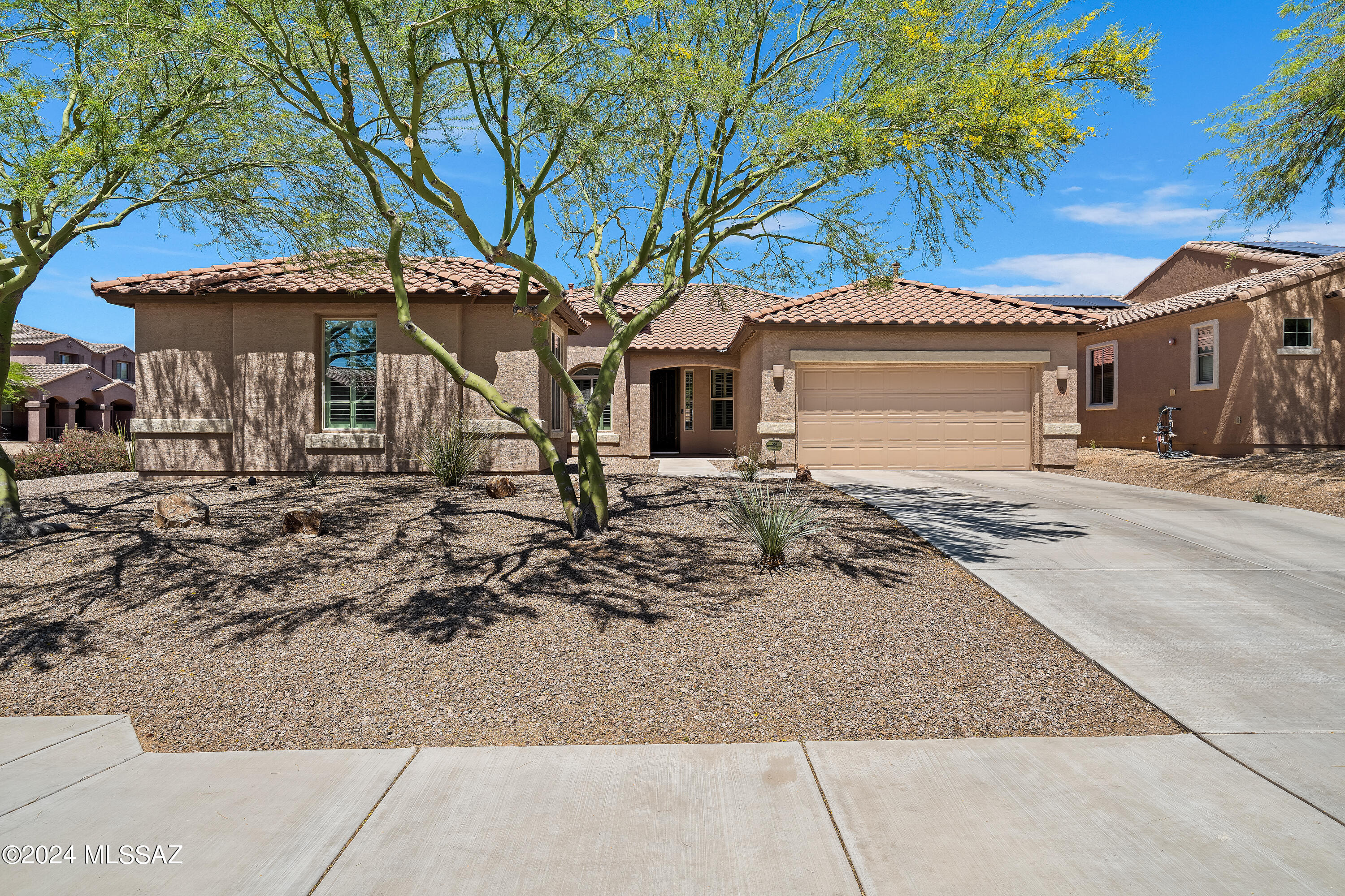Your Dream Oasis Awaits! Escape the ordinary in this captivating 4BR, 3BA home within gated Tangerine Crossing. Unwind poolside in your private backyard haven, complete with a sparkling pool and spa, just steps from a charming pocket park. Picture perfect evenings spent relaxing on the patio in the serene cul-de-sac setting. Inside, entertain effortlessly with a gourmet kitchen boasting extended cabinets and sleek tile flooring throughout. Don't miss this opportunity to create lasting summer memories in your own piece of paradise!