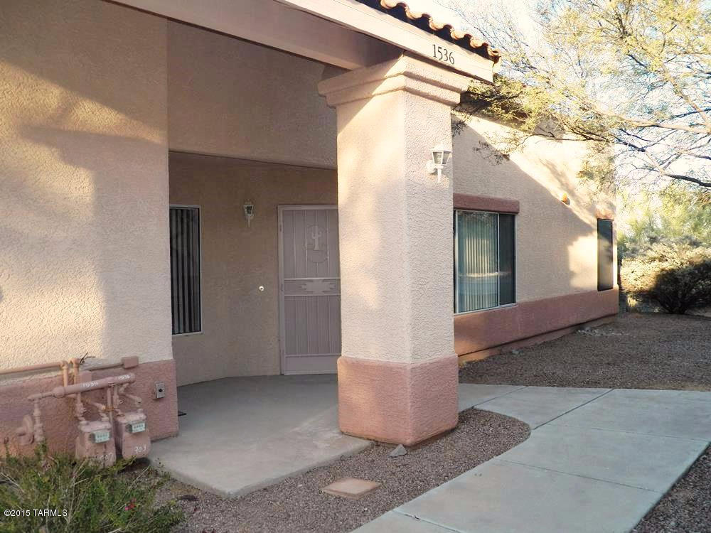 Great value for a newer 2BR 2BA townhome. Well maintained and upgraded. 100% ceramic tile floors. Recently painted interior in desert tan. Remodeled master bath has very nice tile walk-in shower. Split bedrooms-each with a walk-in closet. Security screened rear patio faces common area. All landscaping maintained by HOA. Roof recoated and new water heater in 2013. Not age restricted. GV Recreation is available but not required. Monthly HOA fee covers pool/spa maintenance, exterior paint/stucco repair, trash disposal, pest control, termite warranty, street maintenance.