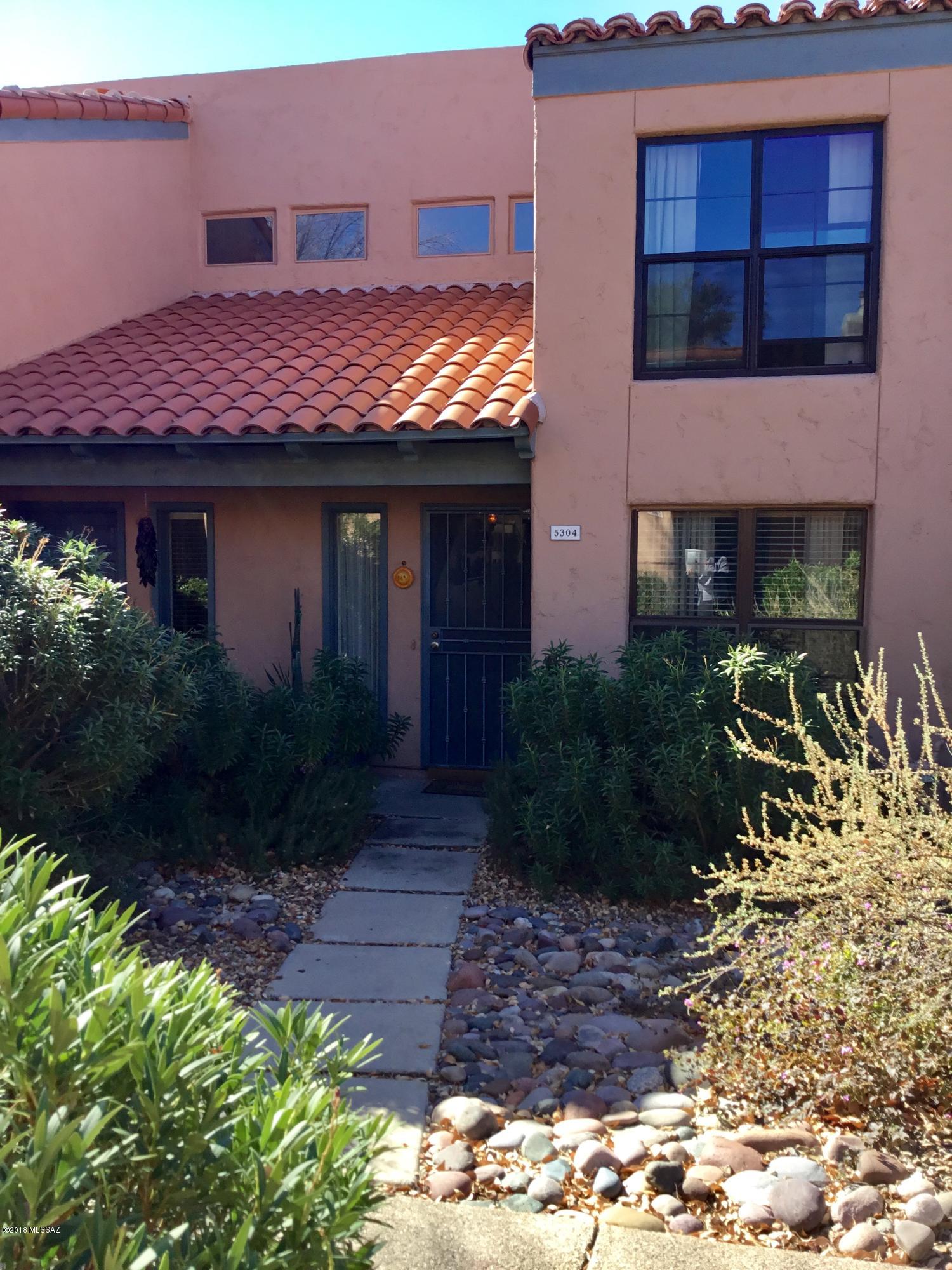 Welcome!  Well maintained TH located in highly sought after Ventana De Sabino offering wonderful privacy and amenities in a beautiful, resort like, quiet setting.  2Br/2Ba charmer boasts bright, open great rm w/FPLC and soaring ceilings leading to loft above.  Kit has granite, dbl sink, newer applc's, and pass through to dining for entertaining.  Also on main flr large bdrm w/full ba, storage and stackable WD in closet.  Upstairs mstr ste w/ba, walk in closet, and loft overlooking great rm w/built in bookcase and nook.  Relax in the tranquility of spacious covered patio backing to wooded preserve and wash.  Residents have 2 pool/spa areas, Tennis, Rec and Exercise Center, and BBQ's.  HOA covers water, trash, building, roof, landscape and common areas. rec center and exercise area, BBQ's, fountains and sidewalks. HOA covers water, trash, building, roof, landscape, common areas and amenities.