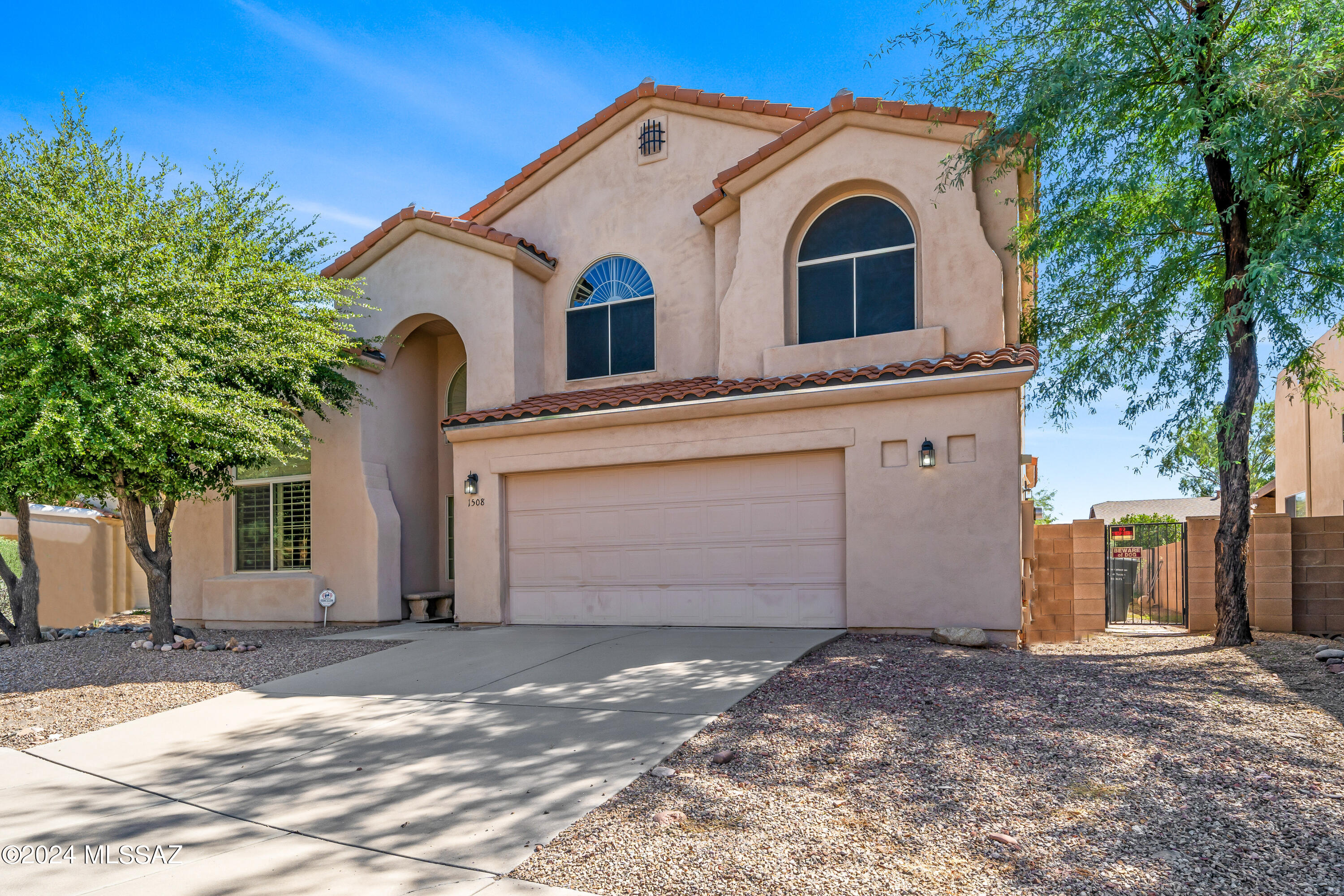 This is great opportunity to get a beautiful four bedroom three bathroom home in the highly desirable La Villa At Pantano. This two story home with a large backyard needs a little freshen up and TLC, but overall a great house.