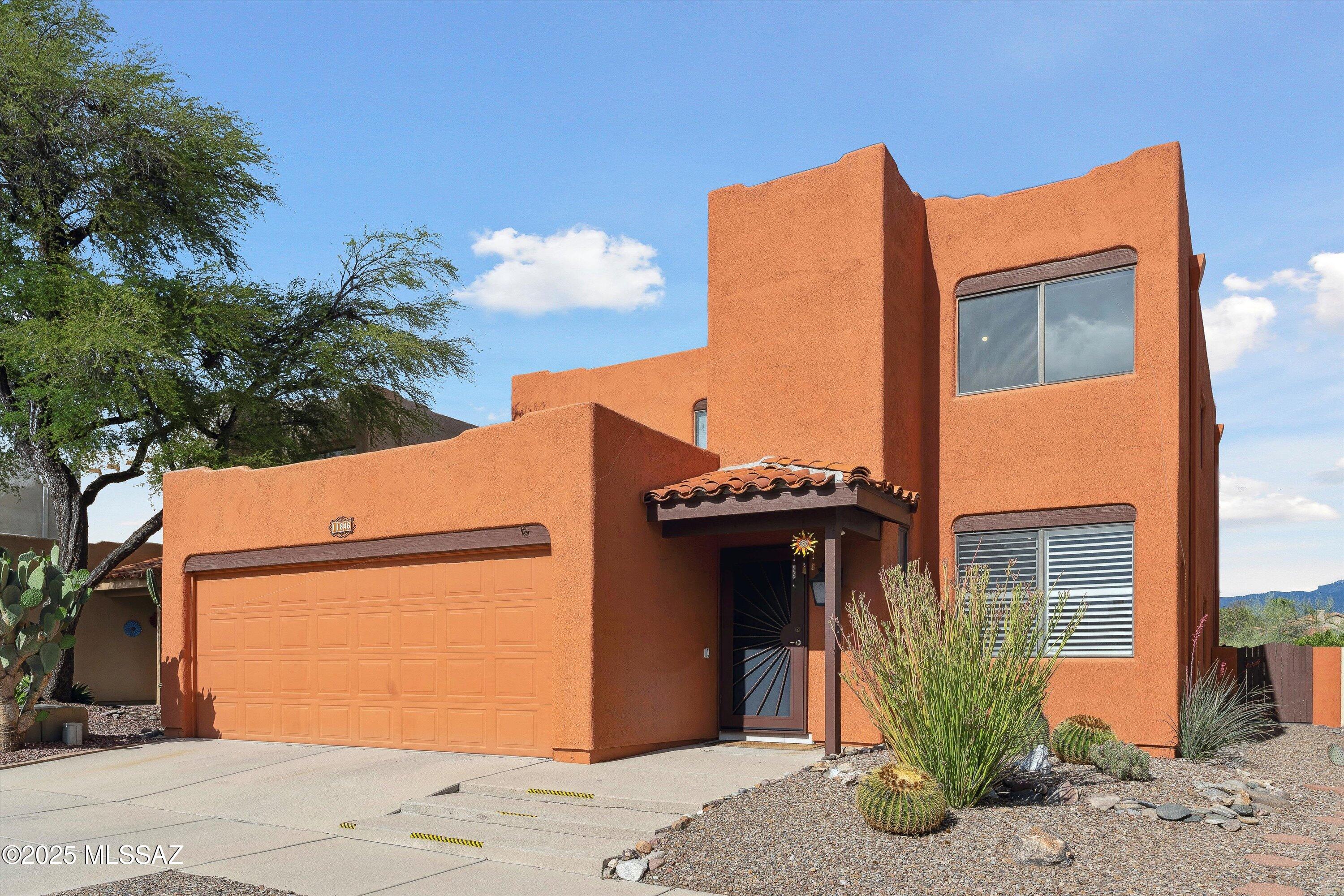 Located in the heart of Oro Valley, this spacious 2,418 sq ft two-story home offers 3 BD/2.5BA, and breathtaking views of the Pursch Ridge and Catalina Mountains.   Home has no poly pipes.  Step inside to find a flexible floor plan featuring separate living and dining area, a cozy family room with a fireplace, and versatile flex room-perfect for a home office or hobby space. The upgraded master suite boasts a private balcony with sweeping mountain views and a beautifully updated en-suite bathroom. Enjoy the peace and privacy of a tranquil backyard with natural desert landscape and no rear neighbors. Just minutes from top-rated schools, shopping, dining, and endless opportunities for walking and hiking, this home offers the perfect blend of comfort, convenience and scenic beauty.