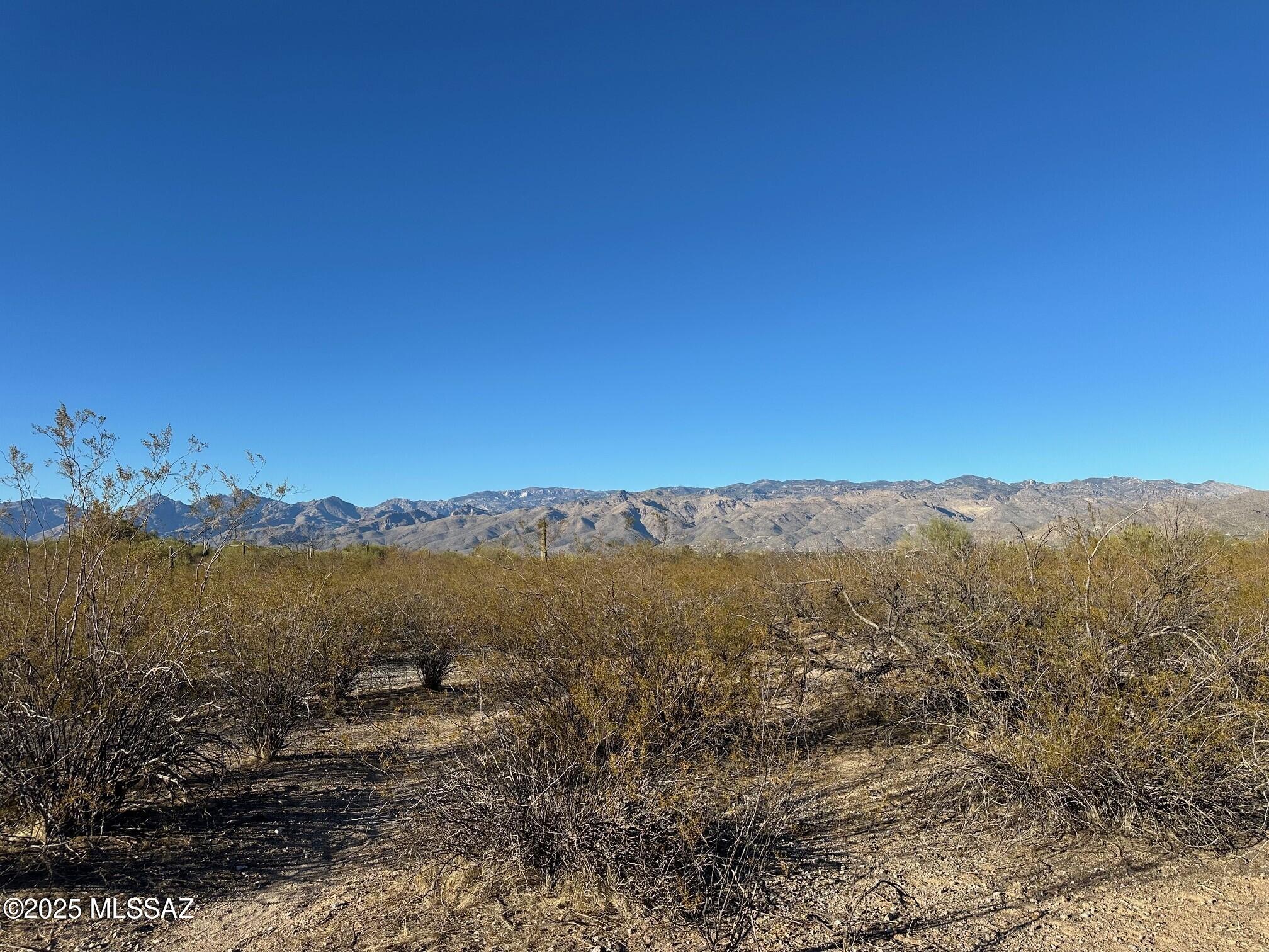 Lot split in process. There will be two, ~4.81 acre parcels available for $249,000 each or you can purchase 9.62 acres for $495,000. The land has gorgeous mountain views with beautiful sunsets and sunrise. Most of the land is flat with a little texture. You can build a house, a guest house and it's zoned for horses. No HOA!  In the Tanque Verde School District. Seller is a licensed realtor in the state of Arizona.