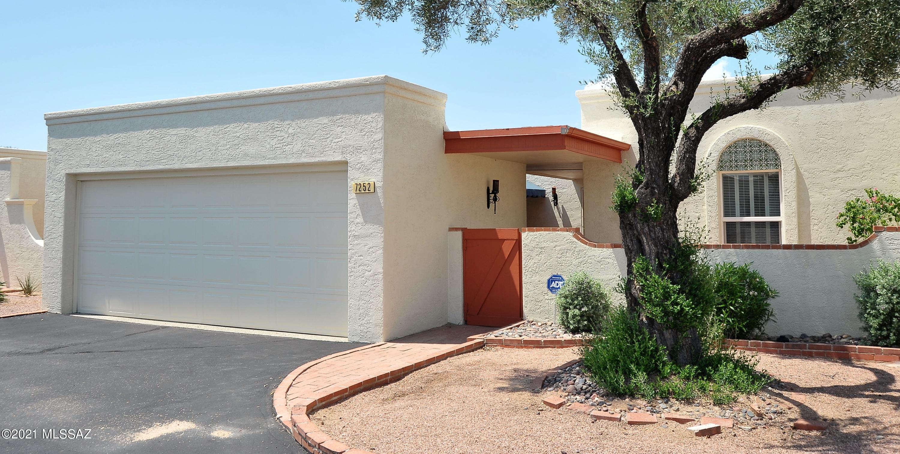 Located in the highly desirable Colonia Verde community. This 3-bedroom-2-bath townhome is bright, welcoming, and move in ready! Updated kitchen boasts cherry wood cabinets, SS appliances & a breakfast bar that flows into the great room to enjoy conversations with the cook. Master suite & bedroom 2 feature a wall of closet space, with bedroom 3 opening onto the enclosed front courtyard. Master bath has been remodeled featuring a step-in tub. Freshly painted and ceramic tile throughout. Enjoy views of the beautiful Catalina mountains from the main living areas, master suite and covered patio. This townhome has one of the best views! Community features two pools, saunas, clubhouse and paved walking paths. HOA covers water and sewer. Close to Sabino Canyon, Udall Park, shopping & resturants.