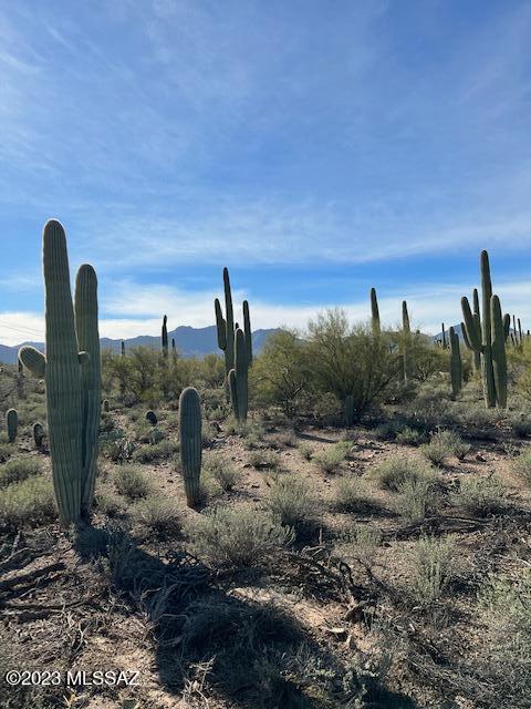 Prime location property.  With spectacular views. Must see! Convenient located near medical facilities, shopping and restaurants with easy downtown access.  SR zoned lot with many stately saguaros and other lush desert vegetation.  Easy access off paved road surrounded by custom homes with a rural ambiance.