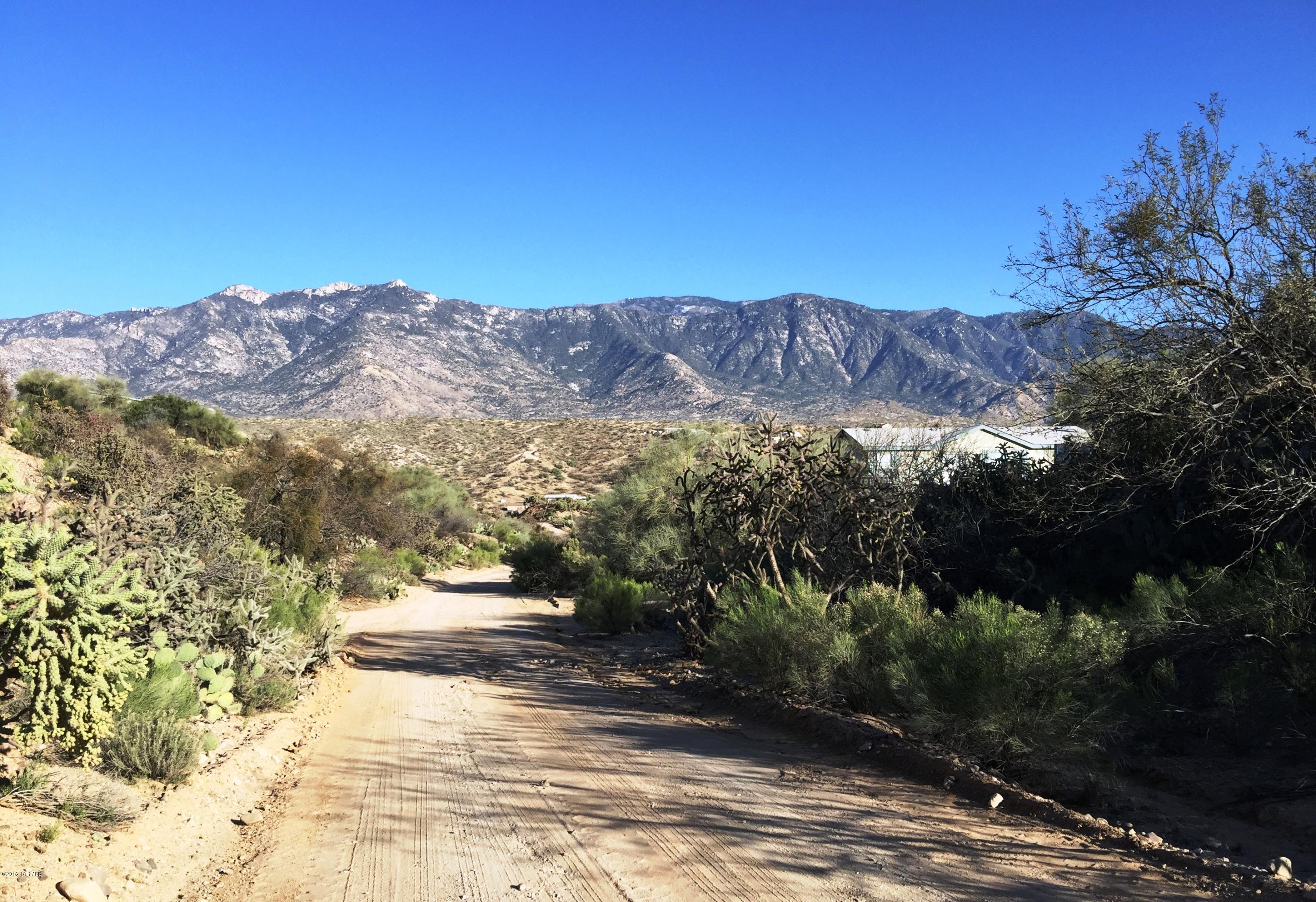 KILLER VIEWS from this hilltop acre for just $99,500-$114,500. See forever from 3,300 ft. altitude perch with 3/2 home with open floor plan, spacious  kitchen, oversized living area, large utility room/pantry, and fenced dog kennel or horse corral. The wood-burning stove will keep you toasty in the cool night air and the patio off Master offers a perfect place to relax with your favorite beverage to enjoy the spectacular sunrise over the mountains each morning! Few lots offer this GORGEOUS MOUNTAIN VIEW and privacy.  HURRY! Owner may carry the right buyer! The answer is NO if you don't ask!