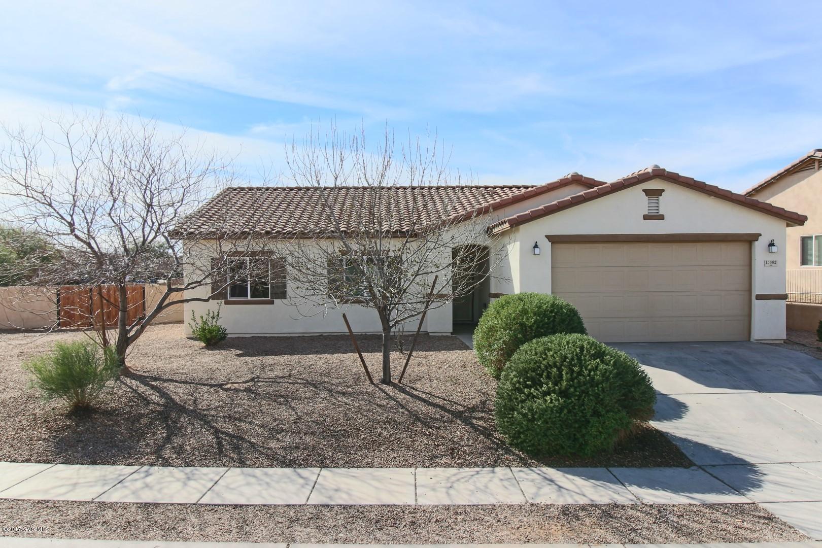 AMAZING home situated on large corner lot!! Open floor-plan with handsome flooring in traffic area. Stainless steel appliances. Washer/Dryer and refrigerator included. 3BA+2BA plus den that can easily be converted to a bedroom. Backyard is loaded with faux grass, 8' gate, dog run. Easy access to Sahuarita Rd and all the amenities in Rancho Sahuarita.