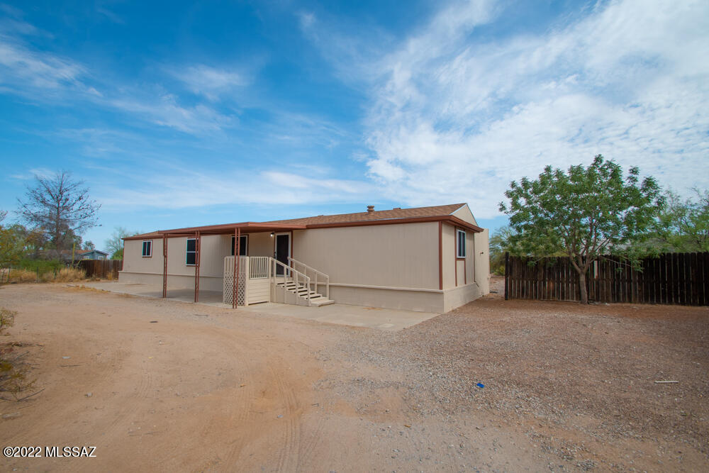 Seller will counter or accept offers from $254,900-$259,900. Amazing remodeled 3 bedroom, 2 bath home on 1 Acre with a guest house! The guest house features a large great room, 1 bedroom, bath, and laundry area. Turn-key with new: flooring, light fixtures, bathroom vanities, brushed nickel fixtures, new HVAC, new roof, and so much more beautiful finishes throughout. This home has a great open floor plan. The kitchen is complete with new stainless steel appliances and modern cabinetry. Step outside into the oversized yard that has plenty of space to make it your own backyard paradise. Water tank in storage area will make it easy for you to conserve water! Make this your dream home! Owner is a licensed agent.