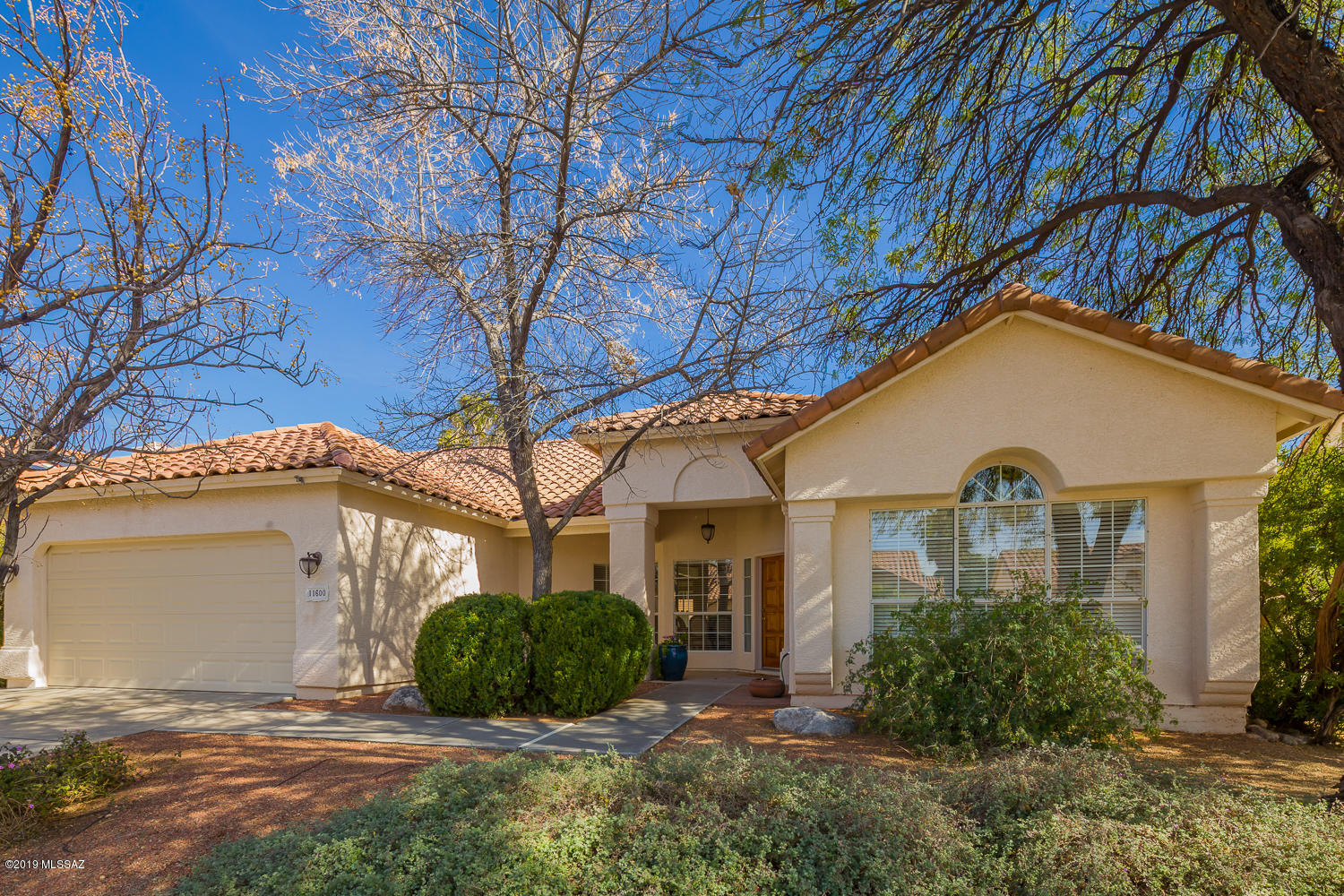 Pride of ownership shows in this original owner Pulte built home in the desirable Copper Creek Community. Mature trees grace the front & provide shade in the summer. Step inside to find a contemporary floor plan with kitchen open to the family room for ease of entertaining. Vaulted ceilings in the family room & plenty of natural light make this space cheerful & bright. Kitchen with stainless appliances including a gas range with double oven. 18' neutral tile floors in most main areas. Formal dining room boasts an octagonal tray ceiling & the living room has a cathedral ceiling providing architectural interest. Split bedroom plan with all 3 bedrooms having easy care laminate wood flooring. Private backyard with fenced pool & green grass that will make you want to take your shoes off & dance Carrier HVAC new in 2016. One year 2-10 Home Warranty included. White Maytag washer, Whirlpool Dryer,& Whirlpool side by side refrigerator convey. Community is walking distance to Niranja Park, Copper Creek Elementary and within two miles of shopping, restaurants, Oro Valley Golf, Oro Valley Hospital. Bike and walking paths are nearby. The Copper Creek HOA provides events such as community yard sales twice/year, holiday lighting competitions & hayrides. A must see home and community!