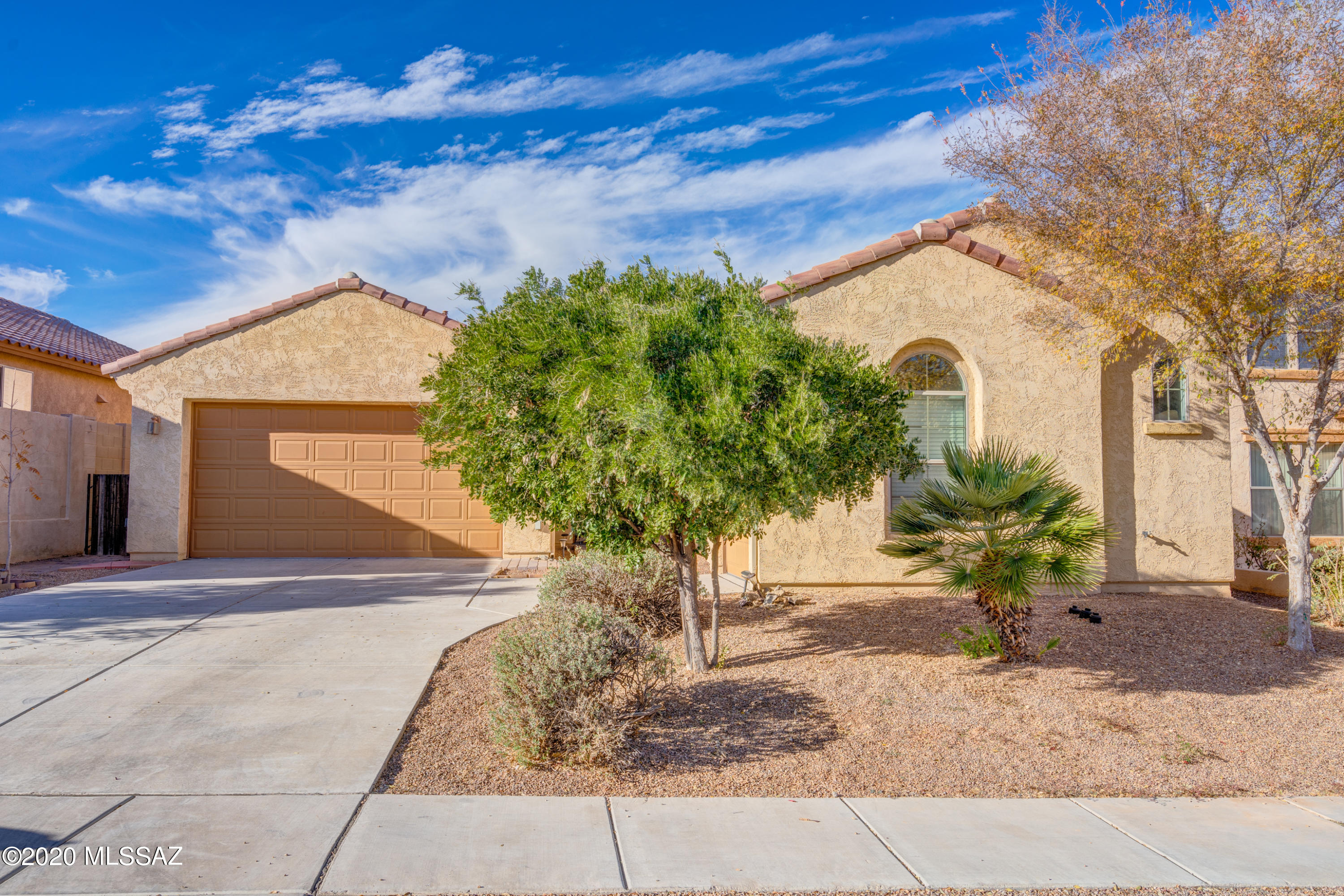 Beautifully maintained Rancho Sahuarita Home in the desirable gated subdivision of Entrada Bonita! Close to schools, restaurants, parks, community pools and the Clubhouse. This open floor plan single-story home is ideal for entertaining. Gorgeous upgrades include kitchen over-sized island, upgraded cabinets, beautiful granite countertops, gourmet kitchen, additional dining area over looking your private back yard with fire pit, ceramic tile throughout, covered patio, pavers, artificial grass and so much more!! Welcome to your new home !