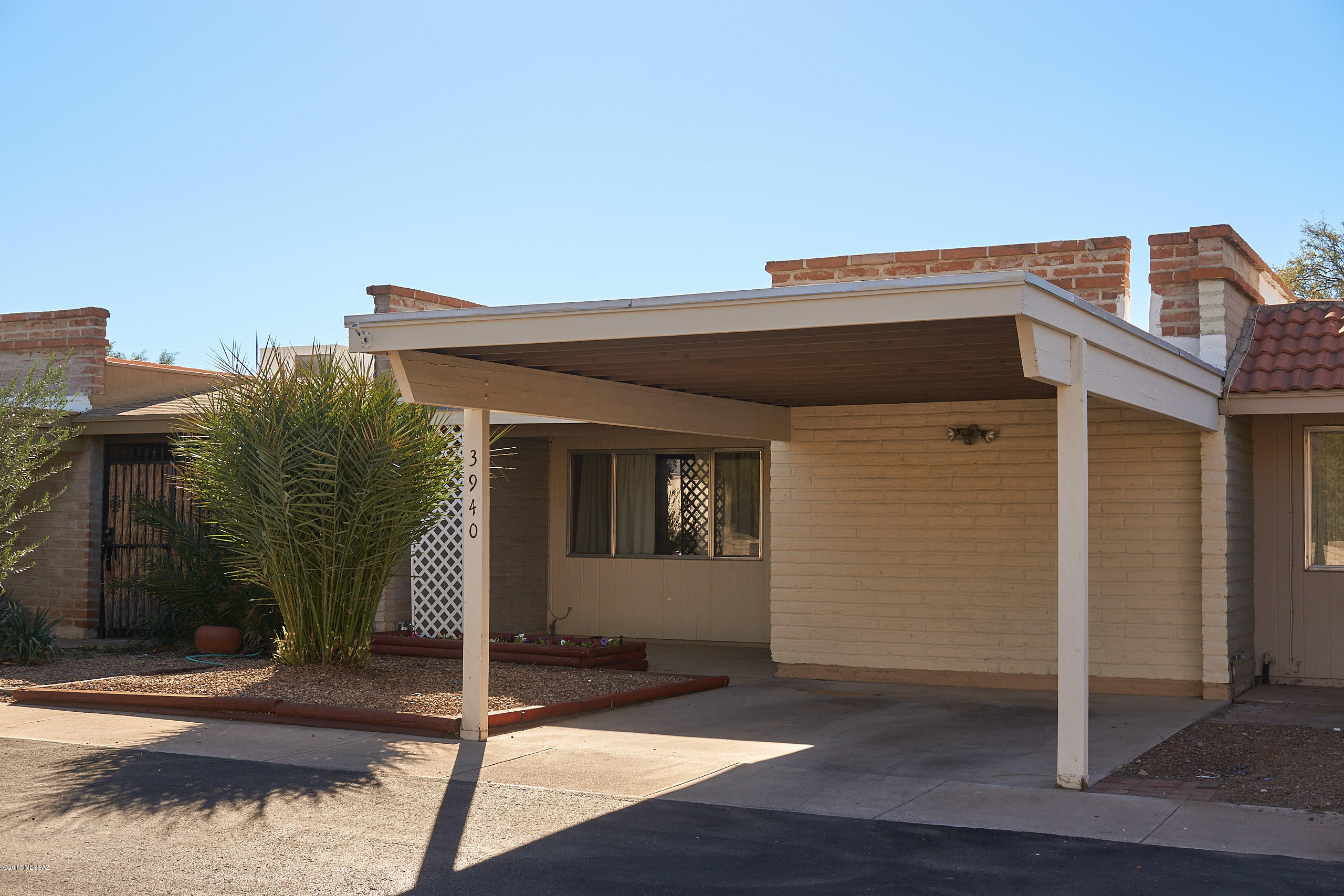 Charming 2 bed/2 bath Town home ready for move in. This beautiful home features a large split bedroom floor plan with attractive tile and carpet throughout.  This newly painted town home has upgraded fixtures and hardware in the spacious kitchen and a beautifully tiled counter top.   Bathrooms have been upgraded with new vanity, plumbing, hardware and light fixtures.  The backyard has a great size covered patio with newly installed pavers and turf.  Both front and backyard have a new irrigation system for your gardening needs.  This backyard is perfect for entertaining.   Located in a convenient central location close to shopping and dining.  Come view this  home today!