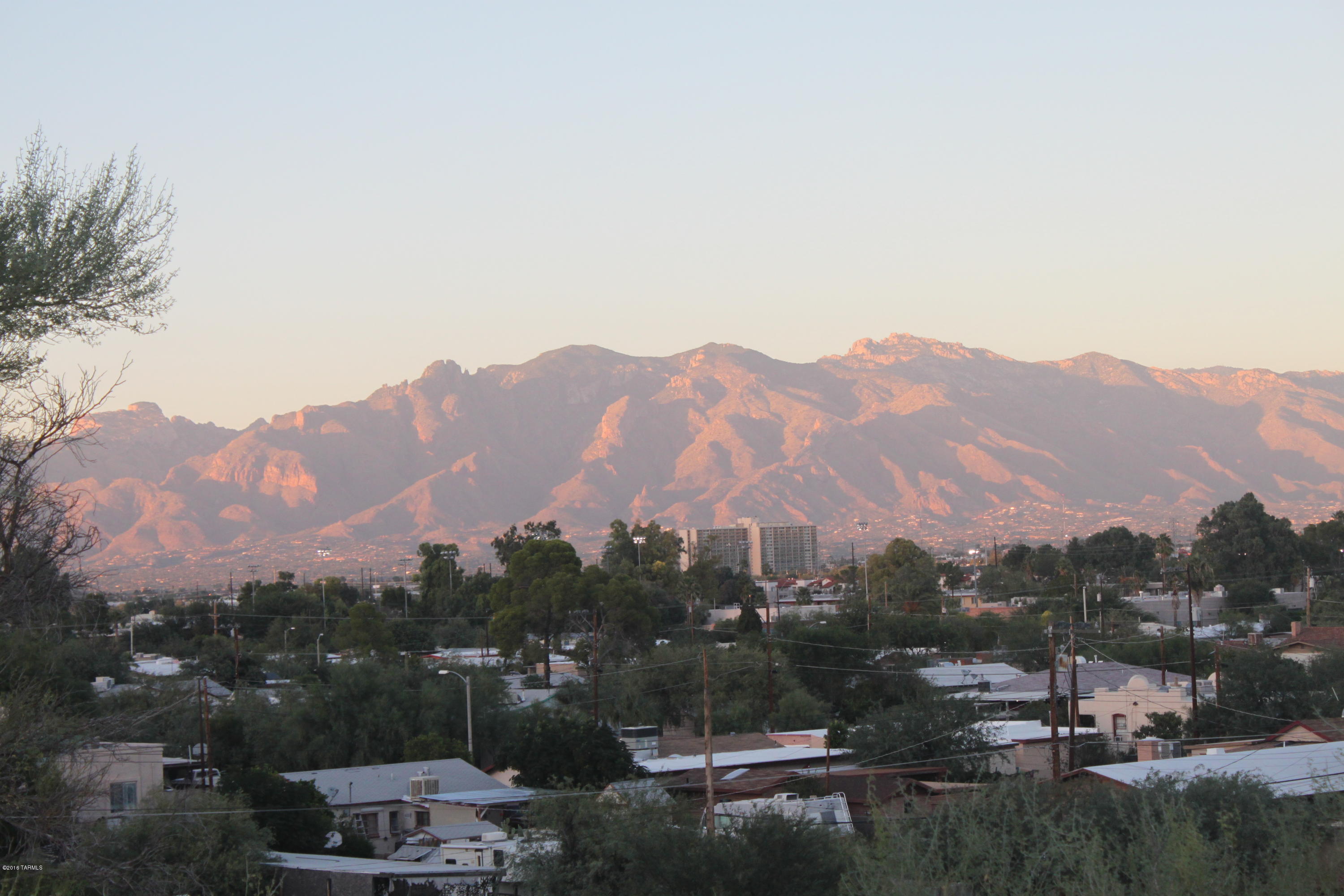 Awe-Inspiring just begins to describe this rare lot that captures an array of mountain and city views. Build your dream home perched on this incredible lot that offers commanding views of the old Pueblo. Easy access and build with all utilities at the lot line. Do not miss this great opportunity to purchase a piece of tranquility with million dollar views.