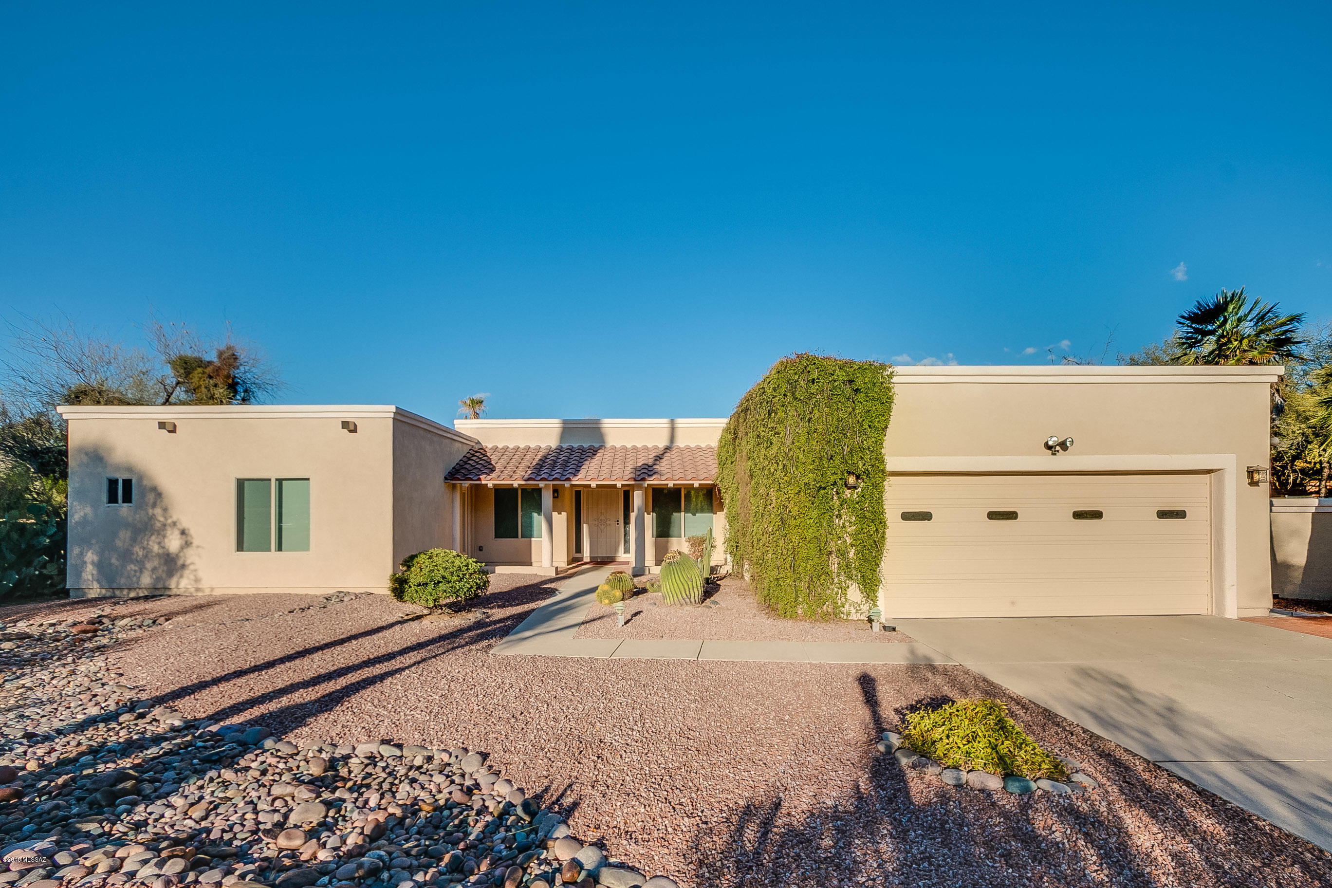 Enjoy the Charm of Sabino Vista SE with the peace of mind of a completely renovated home. This 5BD, 4BA home sits peacefully on half an acre, complete with an extensive backyard, sparkling pool, 2 covered patios and offers lots of privacy. With 3,020 sqft, Interior features include an open floor plan, new kitchen with cherry cabinets, granite counter tops, SS appliances, 3 sided fireplace, ceramic tile throughout home, new bathrooms with luxurious finishes, guest suite with separate entry, new dual pane windows, new wiring, plumbing and roof. This home is immaculate! Great location, minutes away from Basis School.