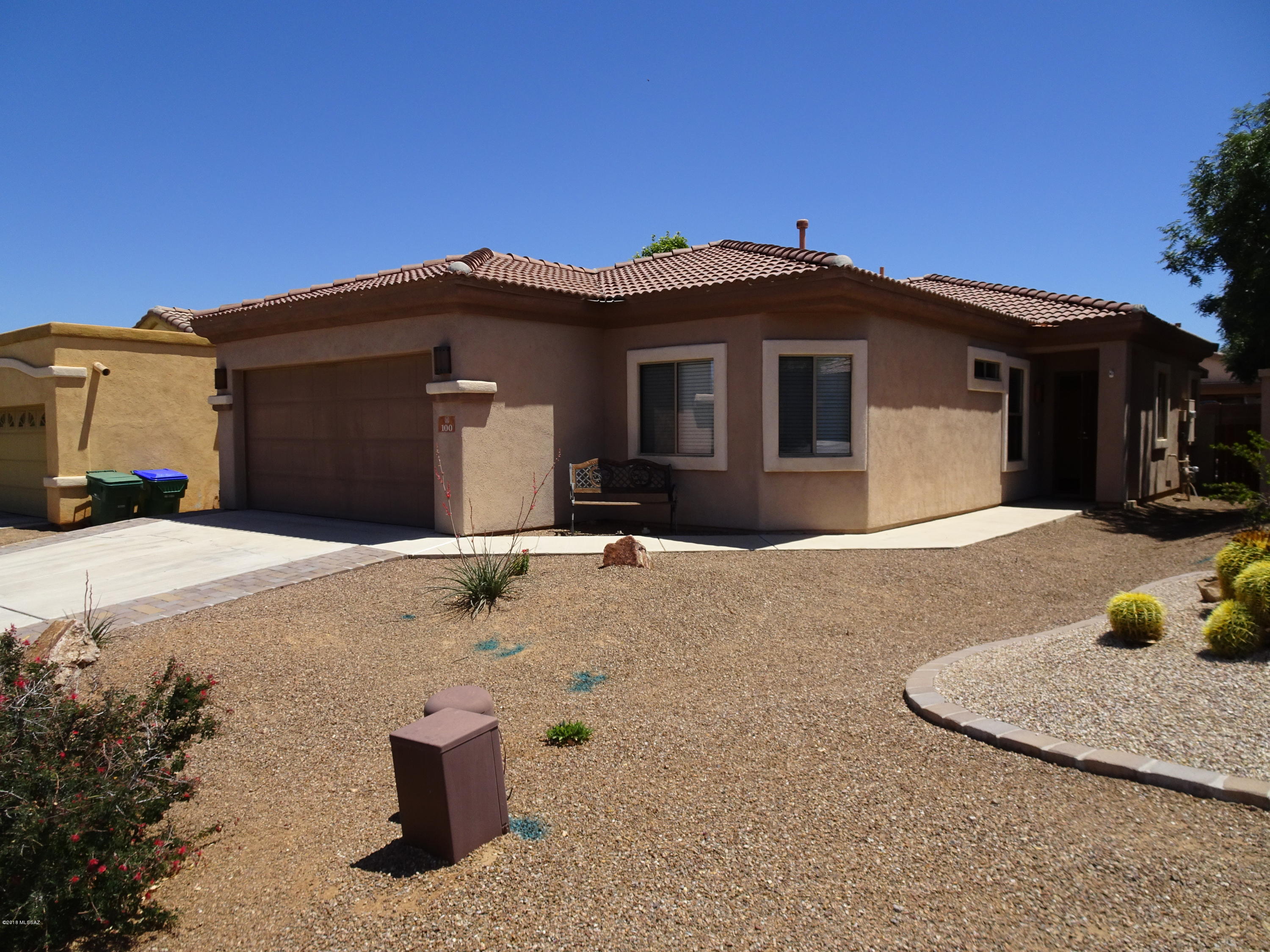 For Sale: 4 bedroom, 2 bathroom home, gated community, central Rancho Sahuarita. Nestled on a corner lot near the community gate, this lovely home offers privacy as well as space. Open floor plan with kitchen, dining, & living areas sharing the same visual space. Never again miss the action when you entertain. Master suite is located off the great room while the other bedrooms, hall bath, & laundry are at the opposite side of the house. Tile in common areas with 1 year old carpets in bedrooms. Covered patio for outdoor entertaining. Near resident-only clubhouse, gym, & pool/water park. Quick walk or bike ride on shaded paths to the lake park for fishing. Central to two neighborhood parks with playgrounds. Copper View Elementary, Anza Trail Middle, Walden Grove HS. Close to school bus stop.