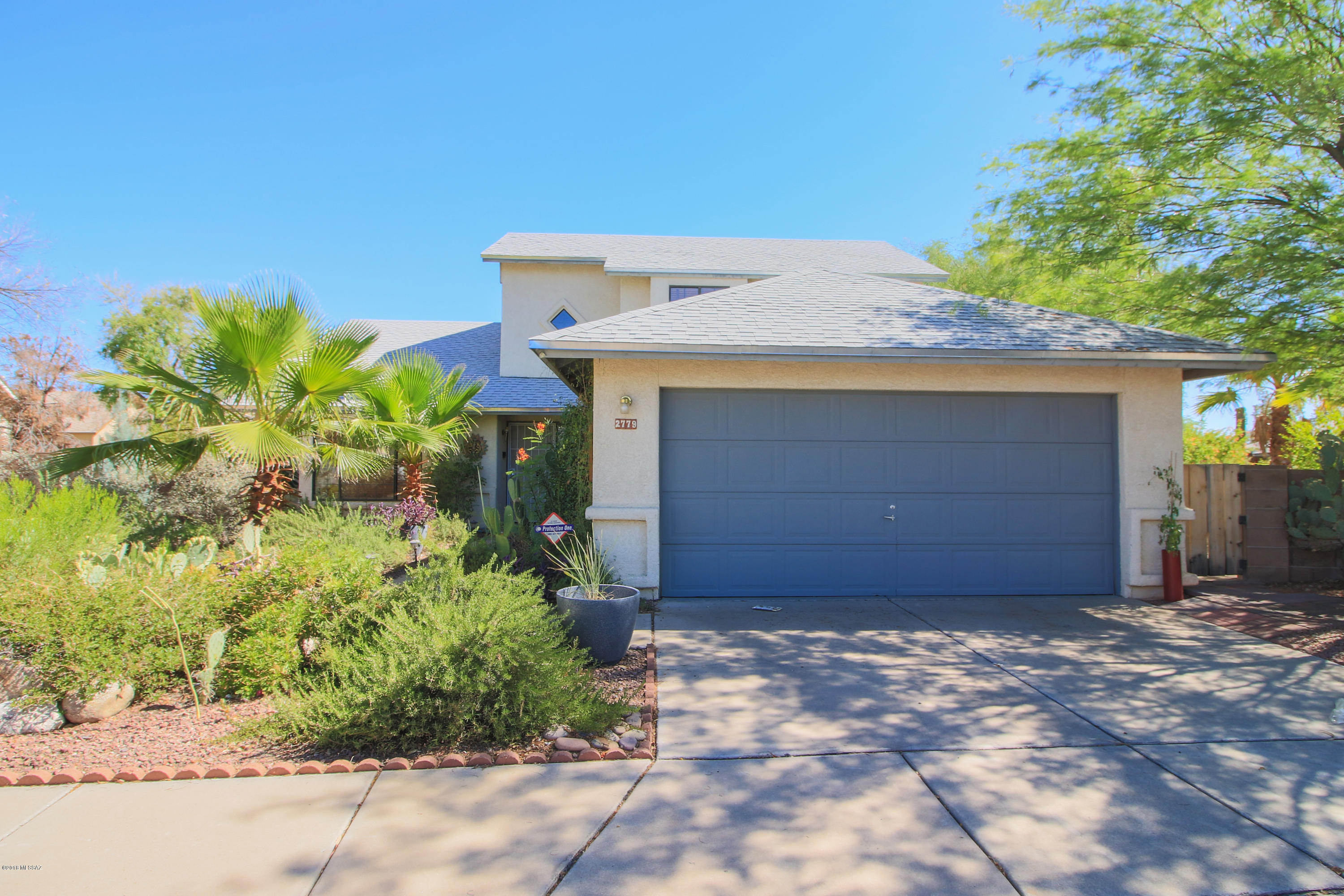 Great 3 bedroom 2 bathroom home with remodeled kitchen in May 2018, new AC unit in 2017, vaulted ceilings, cork flooring in downstairs bedrooms, outdoor storage shed, graywater system in place to recycle laundry water onto plants, five raised garden beds, xeric low-water landscaping, 200+ gallon rain tank, plenty of shade, plenty of fruit trees, new pool pump May 2018, fresh pool water, pool safety net, abundant poolside seating and more. Come see this must-have home with one of the largest backyards in the whole neighborhood!