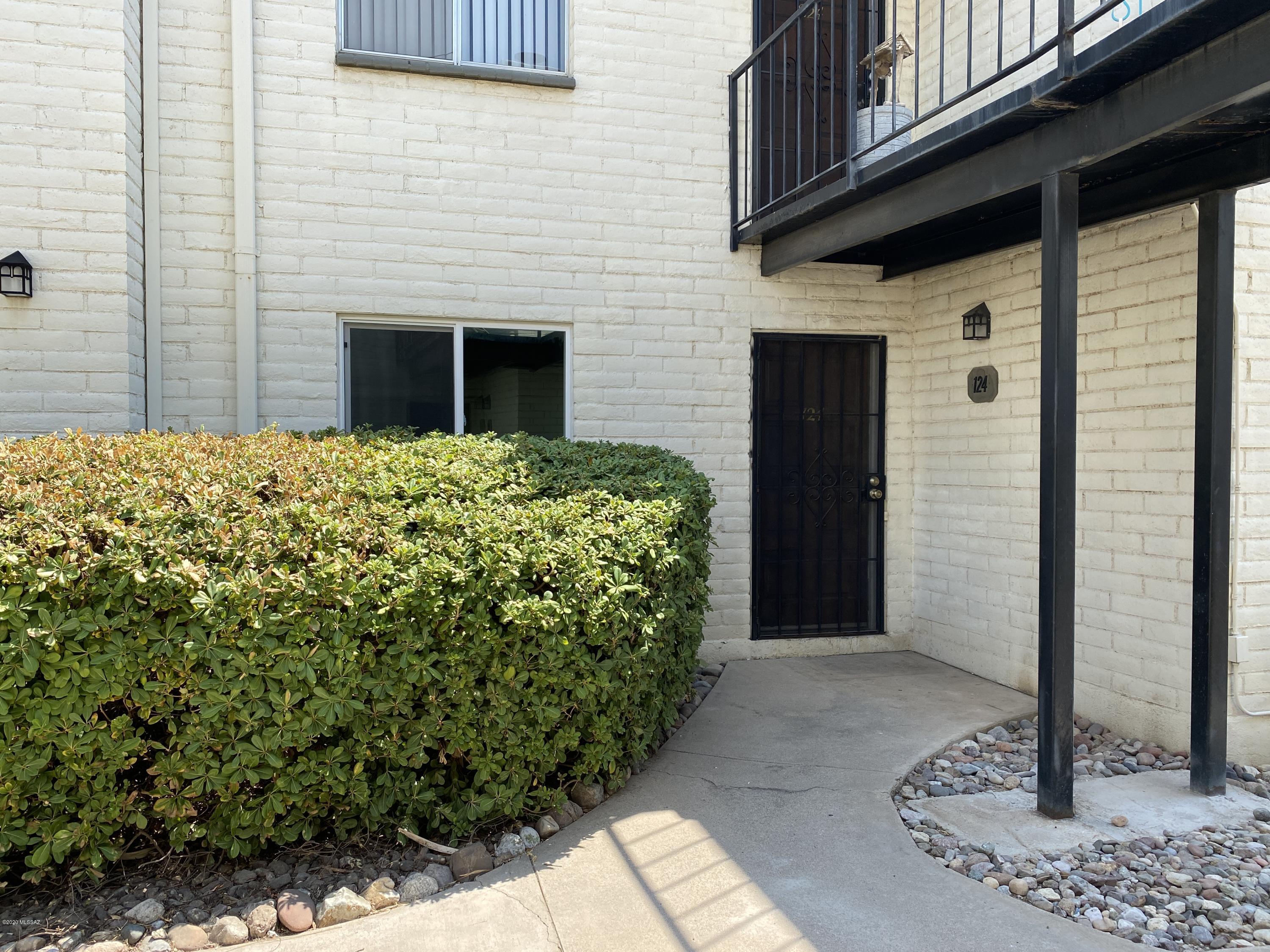 Light and bright ground floor end unit condo in desirable East side of Tucson. Open concept with lots of natural light, freshly painted interior, tile floors, newer dual pane windows (Nov 2019). Beautifully maintained garden-like grounds and just steps away from the community pool/spa, and laundry facilities. Convenient location near Jesse Owens park, Camino Seco Village shopping center, Pantano Wash trails, grocery stores, and just 20 min from U of A. HOA covers roof, boiler hot water, sewer, trash, and amenities. Plus, your personal covered parking spot.