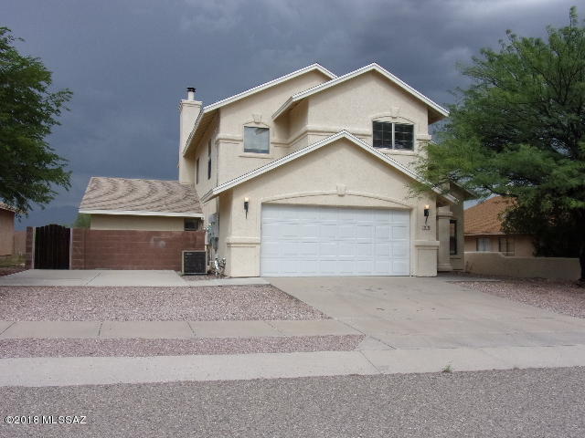 Spacious two story home with 3 bedroom and 2 1/2 bath plus guest quarters with 1 bedroom/1 bath. Living room opens to dining area, separate family room with cozy fireplace. Kitchen has plenty of cabinet space and breakfast island. Great backyard for relaxing and entertaining, nice covered patio and gated in-ground pool. Come see today!