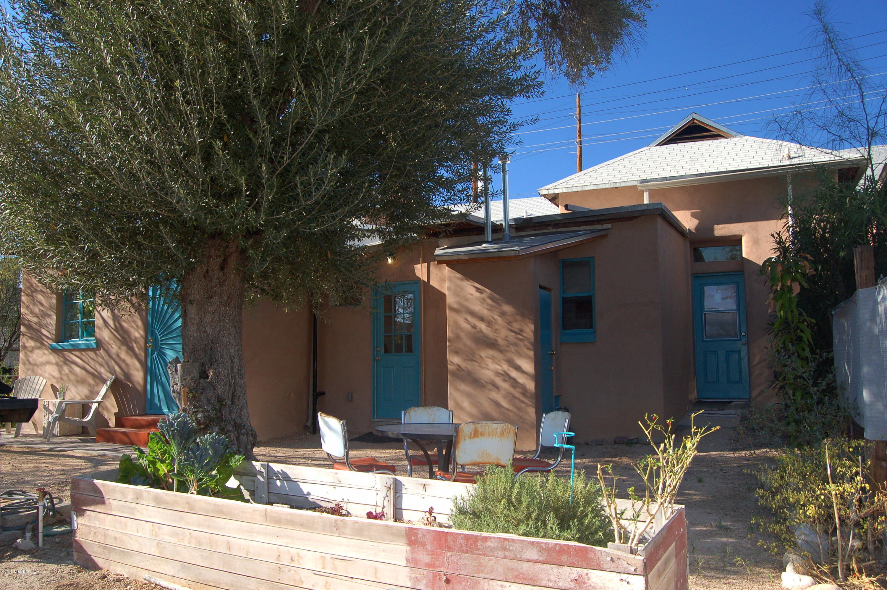 UPDATED TRIPLEX IN HISTORIC DUNBAR SPRING! ALL NEW KITCHENS, APPLIANCES & MINI-SPLITS (in two units). EACH UNIT HAS COOLER...MAKING 2 UNITS DUAL COOLED! SPACIOUS, SHOT-GUN FLOORPLANS. EACH, UNIQUELY STYLED: 60s CHIC, LOFTY & CLASSIC SONORAN. FLOORING: CONCRETE, WOOD & LAMINATE. FRESHLY PAINTED & WELL MAINTAINED. ALL UNITS: SECURITY DOORS FRONT/BACK, SEPARATELY METERED GAS/ELEC. PARKING: ON SITE & STREET. FULLY FENCED. PROPERTY HISTORY DATES BACK TO 1890s. SELLER 2ND OWNER! STONE’S THROW TO: DOWNTOWN, 4TH AVE & UA.