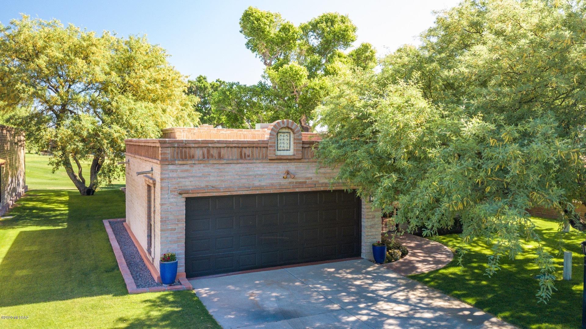 Ideally located and meticulously maintained. This 2200 square foot 2BR/2BA home is situated between a fairway and a green on the renowned  Tubac Golf Course. With towering Cotton wood trees that provide shade in the summer but not imposing on the fabulous views of the Santa Rita Mountains towering to over 10,000 feet in the distance, this home has been re-furbished including new carpet, re-sealed tile work, a custom carved front door, new appliances, repainted on the inside and the burnt adobe brick has been re-sealed on the outside. You can move in and start living the Tubac lifestyle!