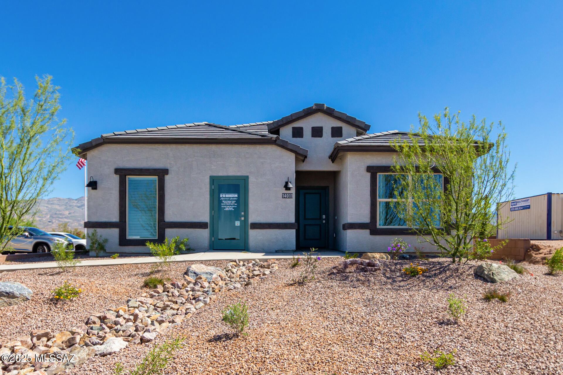 Welcome to the Gaven, a thoughtfully designed single-story new home nestled within the inviting Saguaro Bloom community. With 1,815 square feet of living space, this home offers four bedrooms and two bathrooms, ideal for those seeking a blend of functionality and modern style.
As you enter through the front porch, the foyer opens up to reveal a spacious and open layout that flows seamlessly from the entryway to the living areas. The great room serves as the heart of the home, connecting effortlessly to the dining area and kitchen, making it a perfect space for both relaxation and entertaining Our most energy efficient ZERO ENERGY READY home with spray foam insulation, tankless water heater, solar prewire and energy star rated appliances.