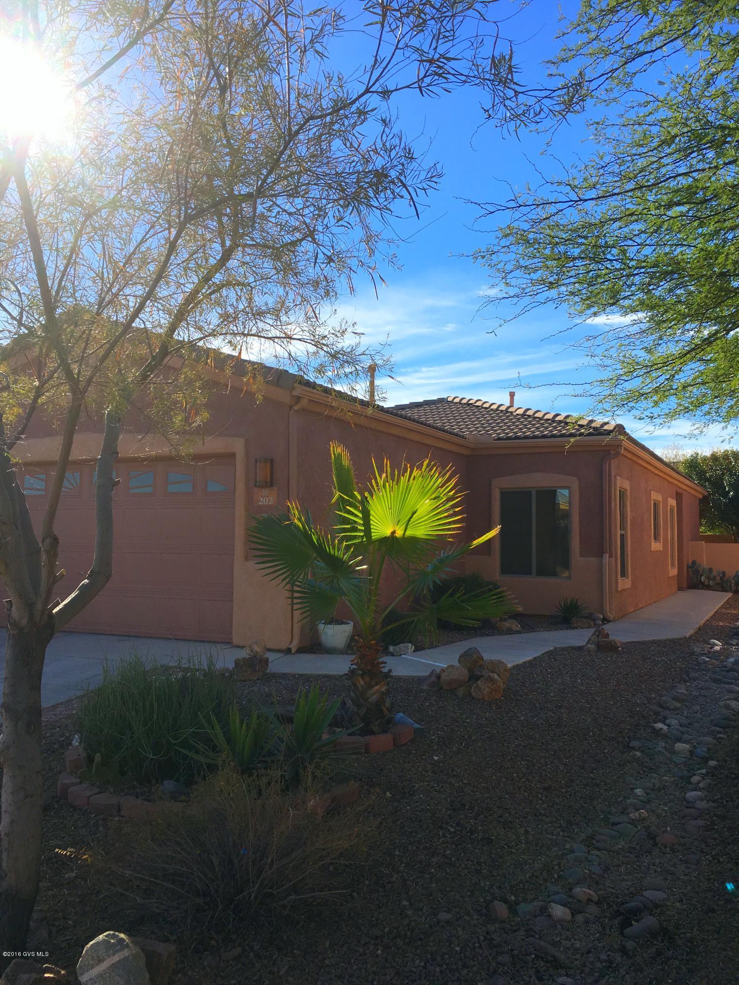 Well maintained home in the heart of Rancho Sahuarita. This newly painted house offers many upgrades including tile throughout, a new stove and all the appliances stay with the house. The home has no rear neighbors which allows you to enjoy the beautiful landscaped back patio. A split bedroom plan gives you privacy in the master, with 2 additional bedrooms at the opposite end of the home for extra space for your family to spread out. This home is move in ready, and at an amazing price. Don't miss this opportunity to be part of an award winning community!