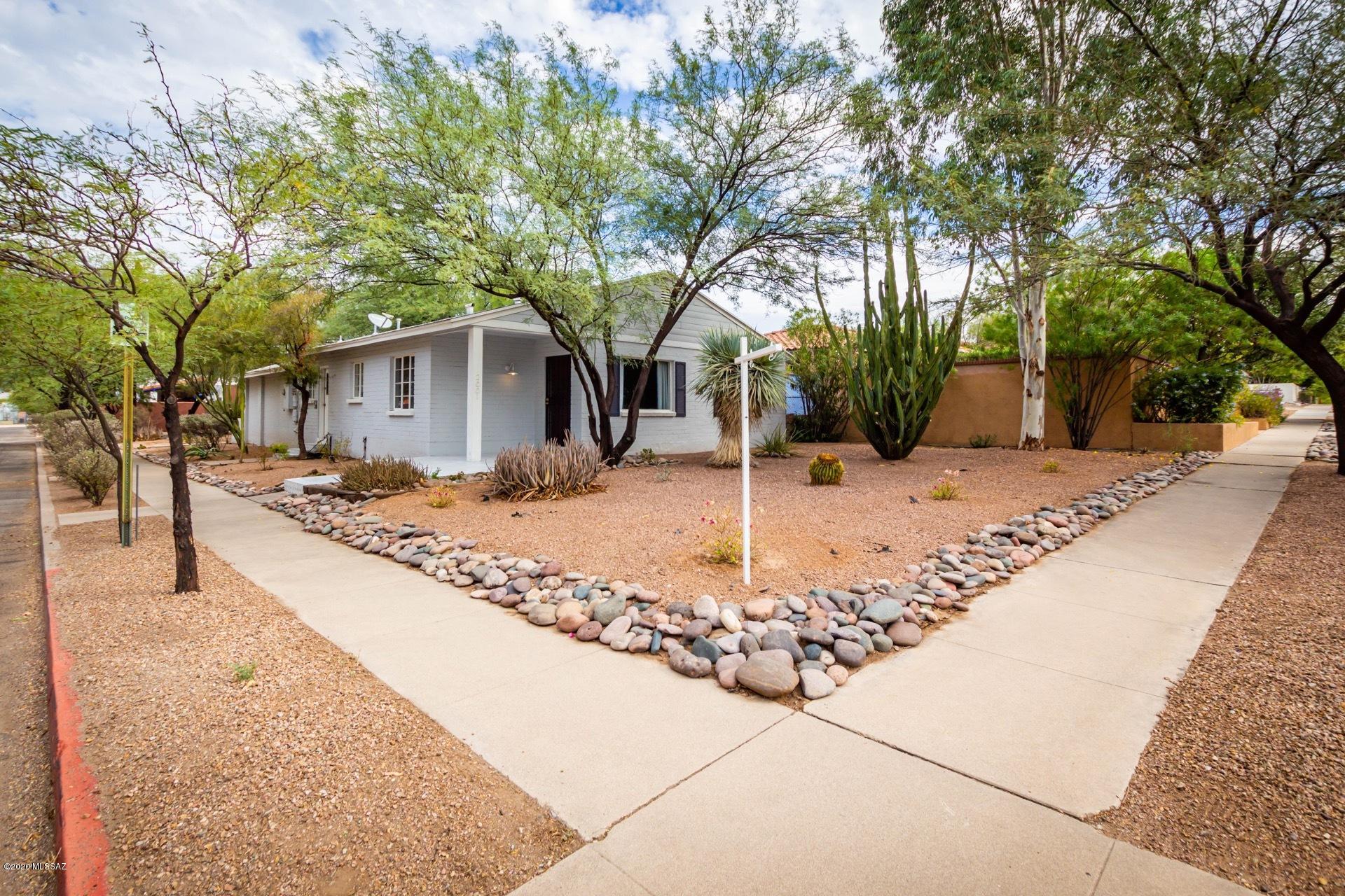 Beautiful home in desirable Blenman Elm neighborhood, close to the U of A, Arizona Inn and UMC-Banner. Main house is 4 bd/2 bath, has new floors, interior and exterior paint, new light fixtures, newly tiled exterior entrance way, added landscaping as well as a newly added bathroom, and completely remodeled beautiful kitchen. The guest house has been consistently rented for $850 a month has a full kitchen, bathroom and private patio very rare income potential! House has a single car garage allowing for off street parking. This house is move in ready or has been an amazing rental investment bringing in $3250 a month since we have owned it! Live in main house and cover part of your mortgage with guest house or rent out the whole thing and sit back collecting a paycheck!  

Owner/agent.