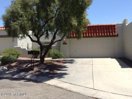 Charming 2Bed 2Bath split floor plan townhome nestled in desirable foothills location! Complete with two car garage, private lush front courtyard, and ample sized back patio area. Soaring vaulted ceilings, ceramic tile throughout, and slate fireplace. Bonus room/Den off family room. Upgraded with newer stainless steel appliances. Central A/C replaced in 2009. Home is set in cul-de-sac within walking distance to sparkling community pool/spa area. Close to shopping, restaurants, and picturesque Sabino Canyon. This one will not last!