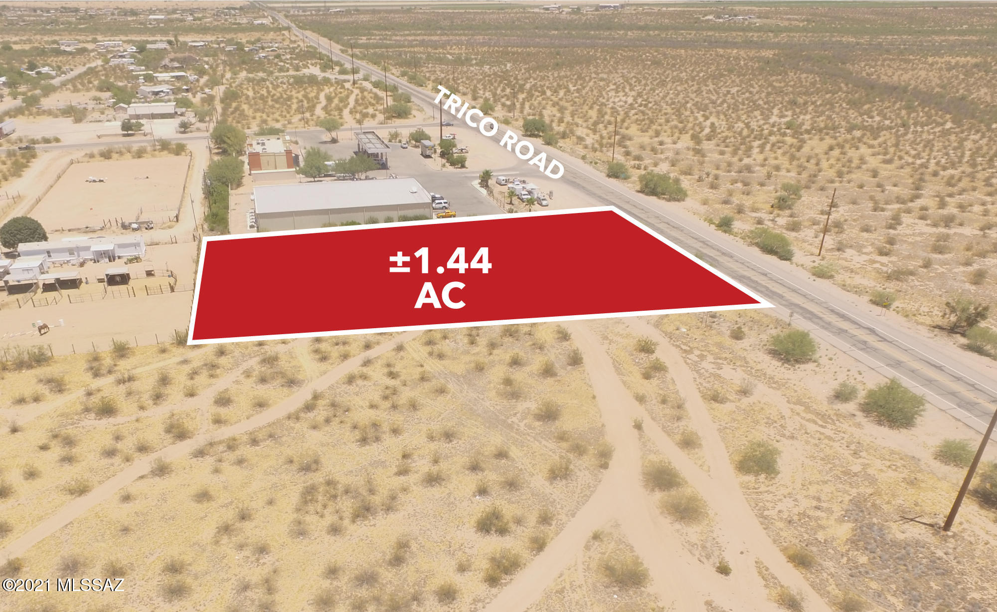 1.4 acres of Commercial zoned lands near Marana adjacent to a Dollar Store.  At a paved busy intersection with a new Dollar Store and nice 7-11 gas station.  Many services are needed in the area.  Such as Auto Shop, Restaurants, and any retail services.  Zoned CB-1 Conditional in the County.